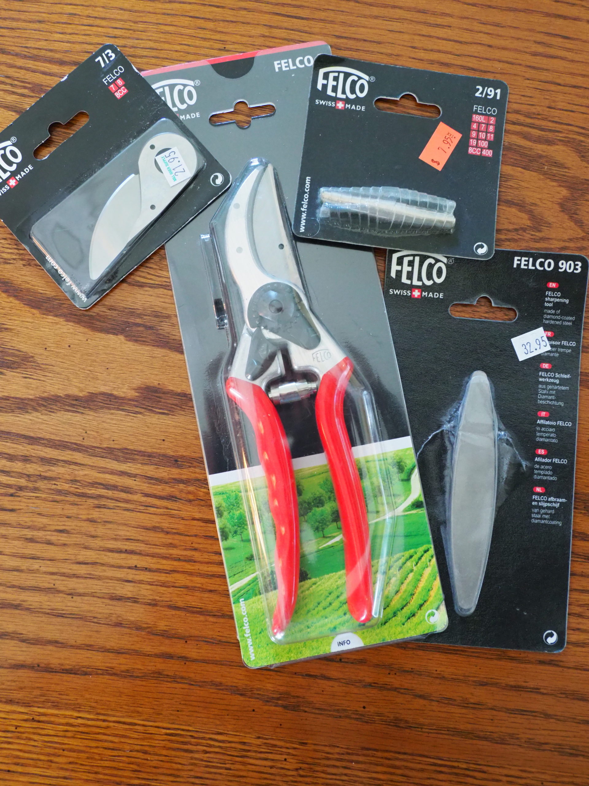 A Felco #2 pruner is hard to beat for a holiday gift. The pruner is about $55. For stocking stuffers there's the replacement blade (left) for about $22, a replacement spring for about $8 and a sharpening stone (bottom right) for about $33. Good things are never cheap.