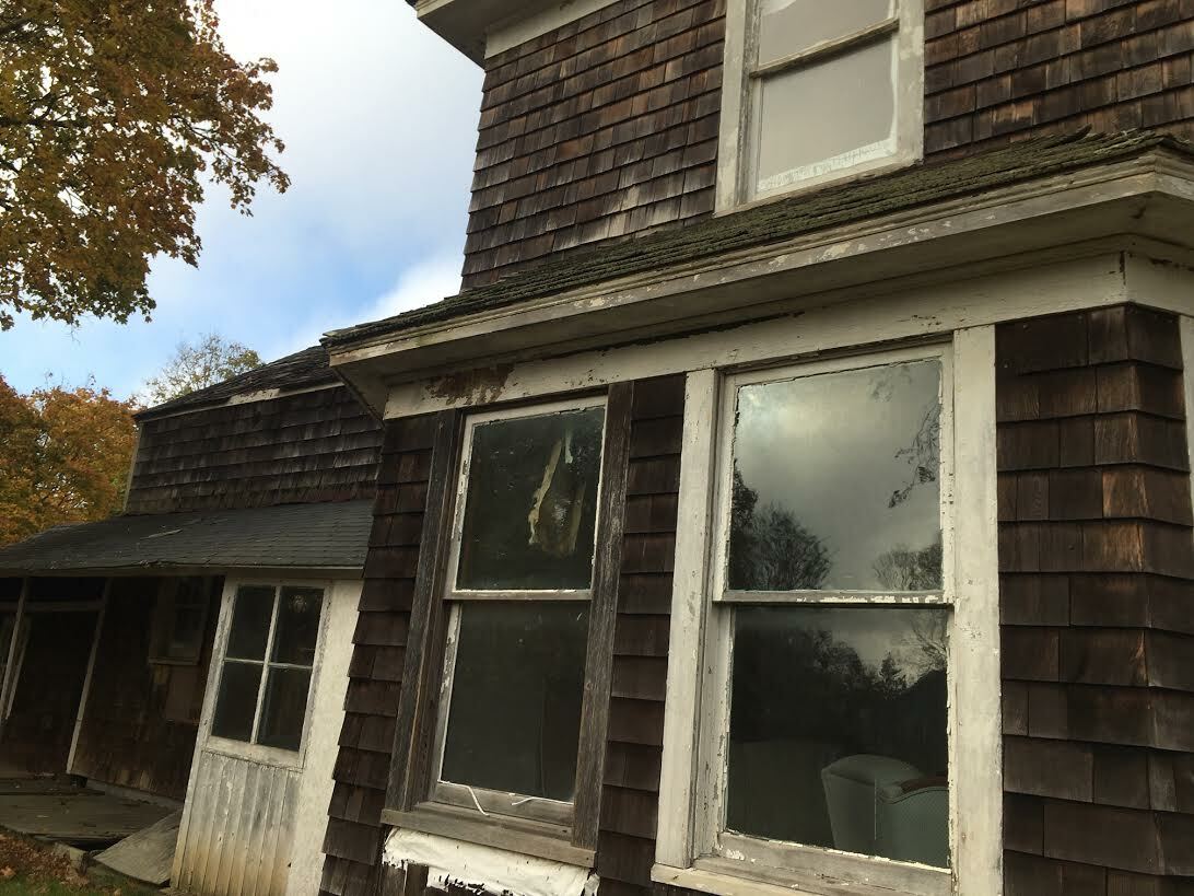 There are an estimated 300 houses in foreclosure in the Town of Southampton, 100 of them vacant and deteriorating like this one in Eastport. KITTY MERRILL