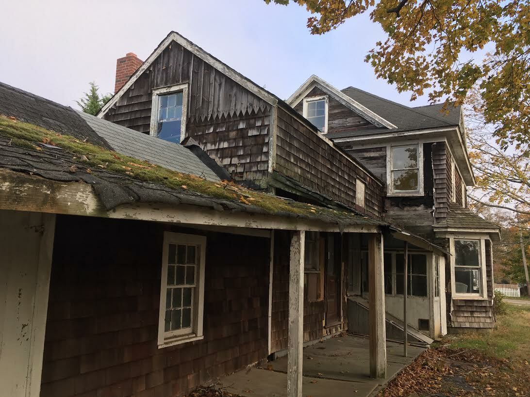 There are an estimated 300 houses in foreclosure in the Town of Southampton, 100 of them vacant and deteriorating like this one in Eastport. KITTY MERRILL