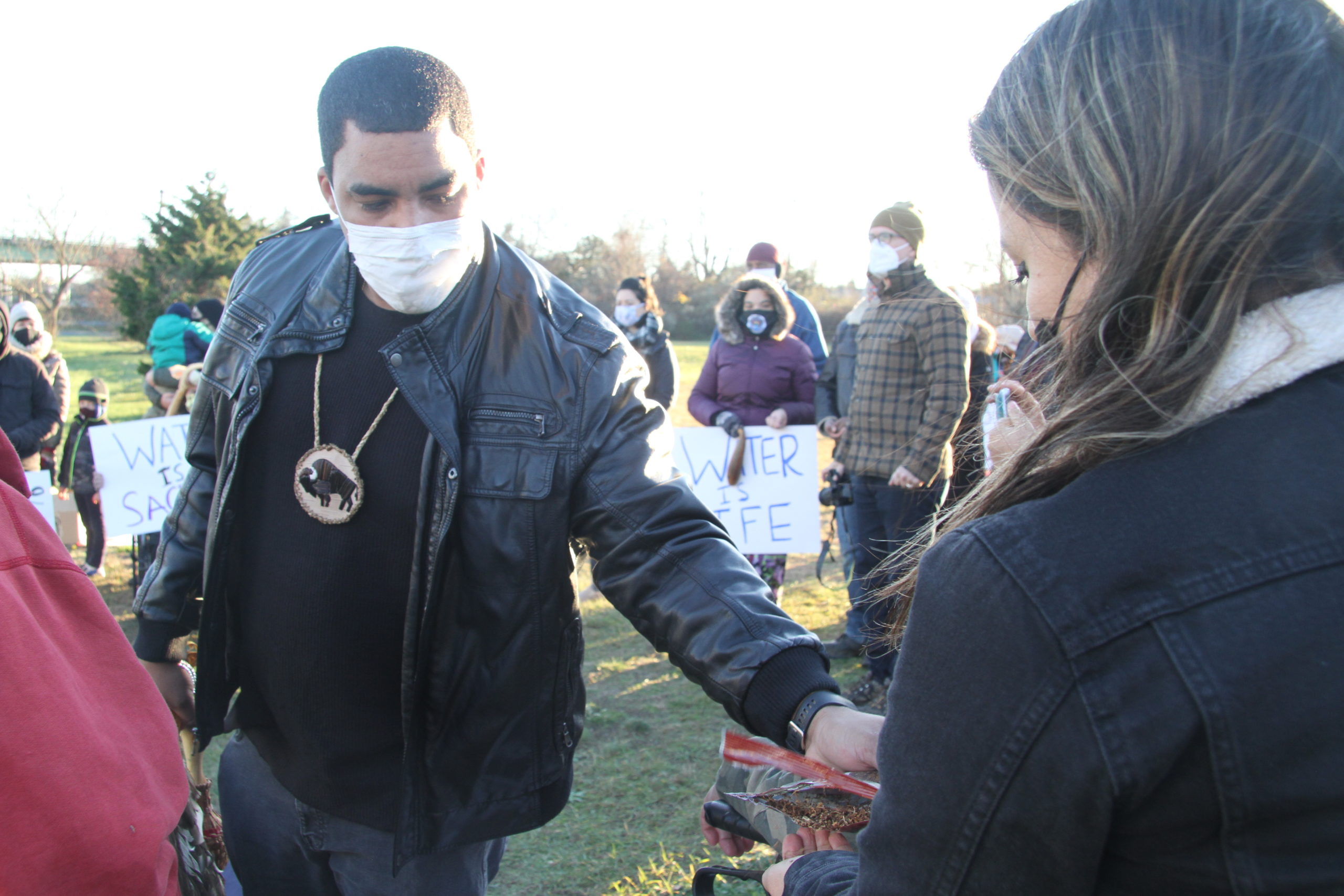 Members of the Shinnecock Nation and dozens of supporters from other tribes, environmental groups and social justice organizations gathered on the banks of the Shinnecock Canal on Sunday afternoon to pray and protest overdevelopment in the region and the impacts humans have had on water quality in the region. 