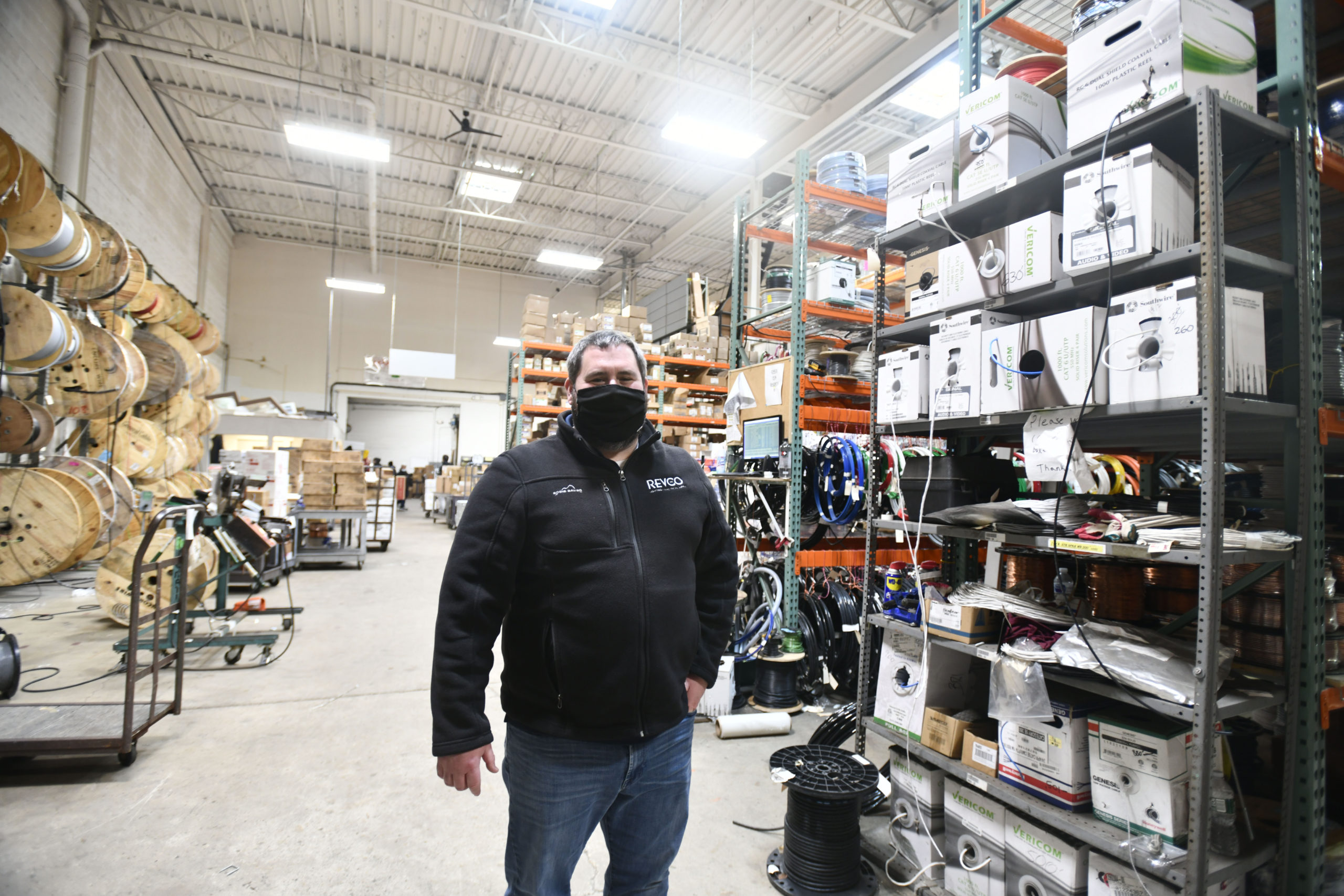 Rob Rossi, Lighting Division Manager at Revco Lighting and Electrical Supply, in the warehouse.  DANA SHAW