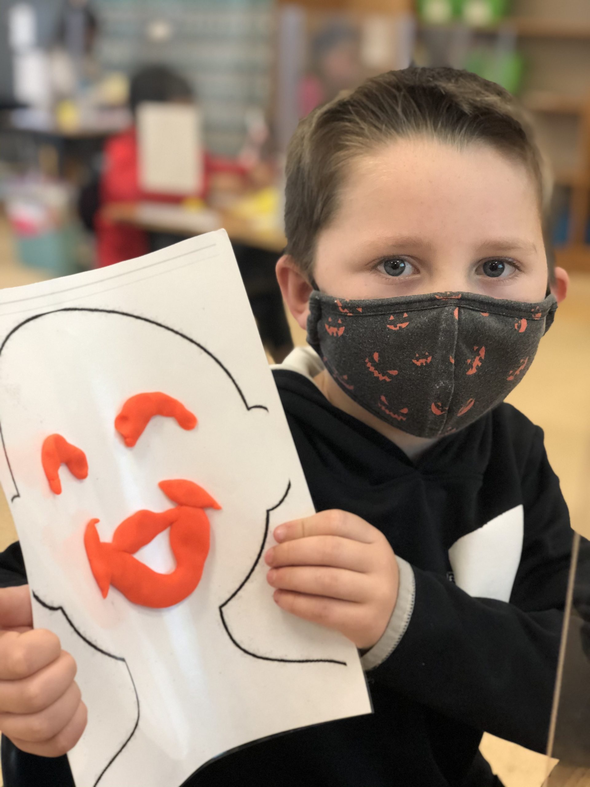 Kade McCormack, in Mrs. Park’s first grade class at East Quogue Elementary School, physically represents, through the use of playdough, one of the six emotions learned in Spanish class. If you guessed “feliz” was the emotion showcased here, you are correct. ¡Fantástico!