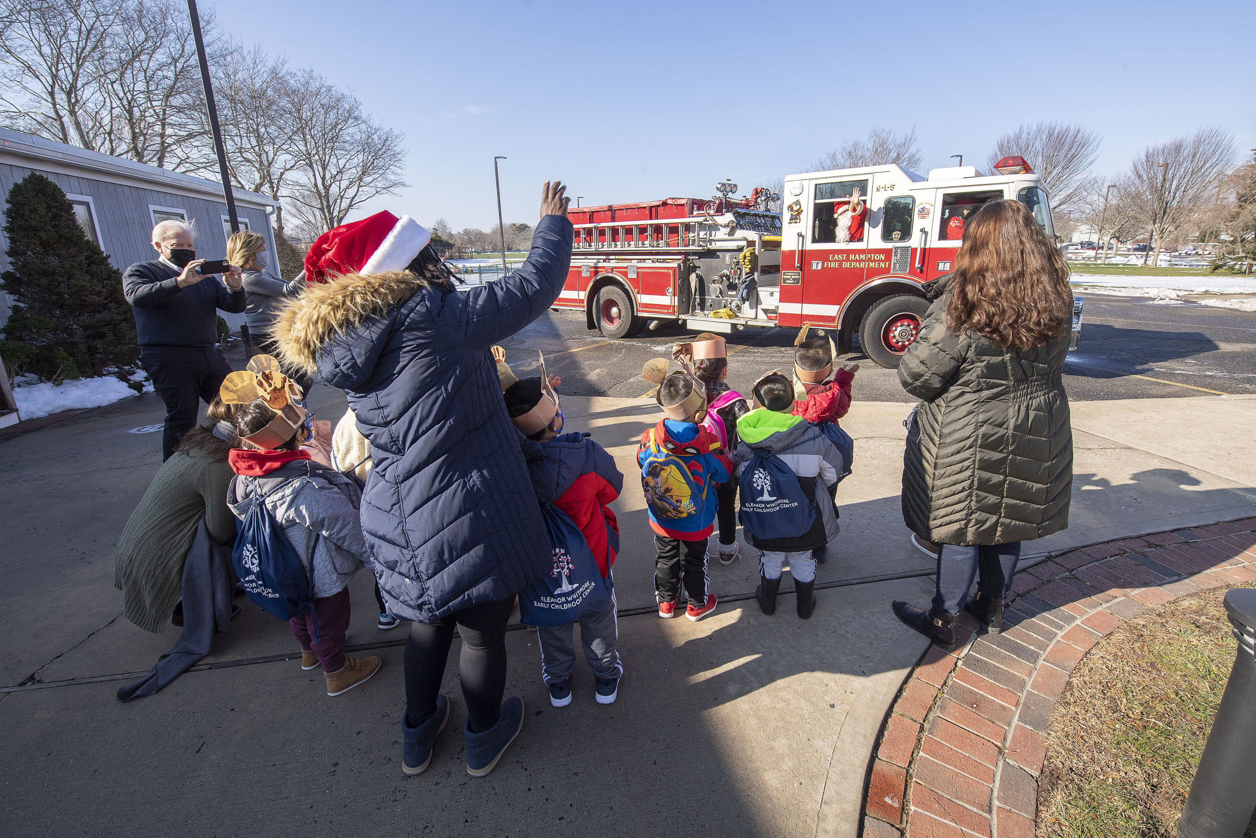 Little ones at the Eleanor Whitmore Early Learning Center in East Hampton were treated to a visit from Santa courtesy of the East Hampton Lions Club and members of the East Hampton Fire Department Engine Company #5 on Tuesday, December 22. 