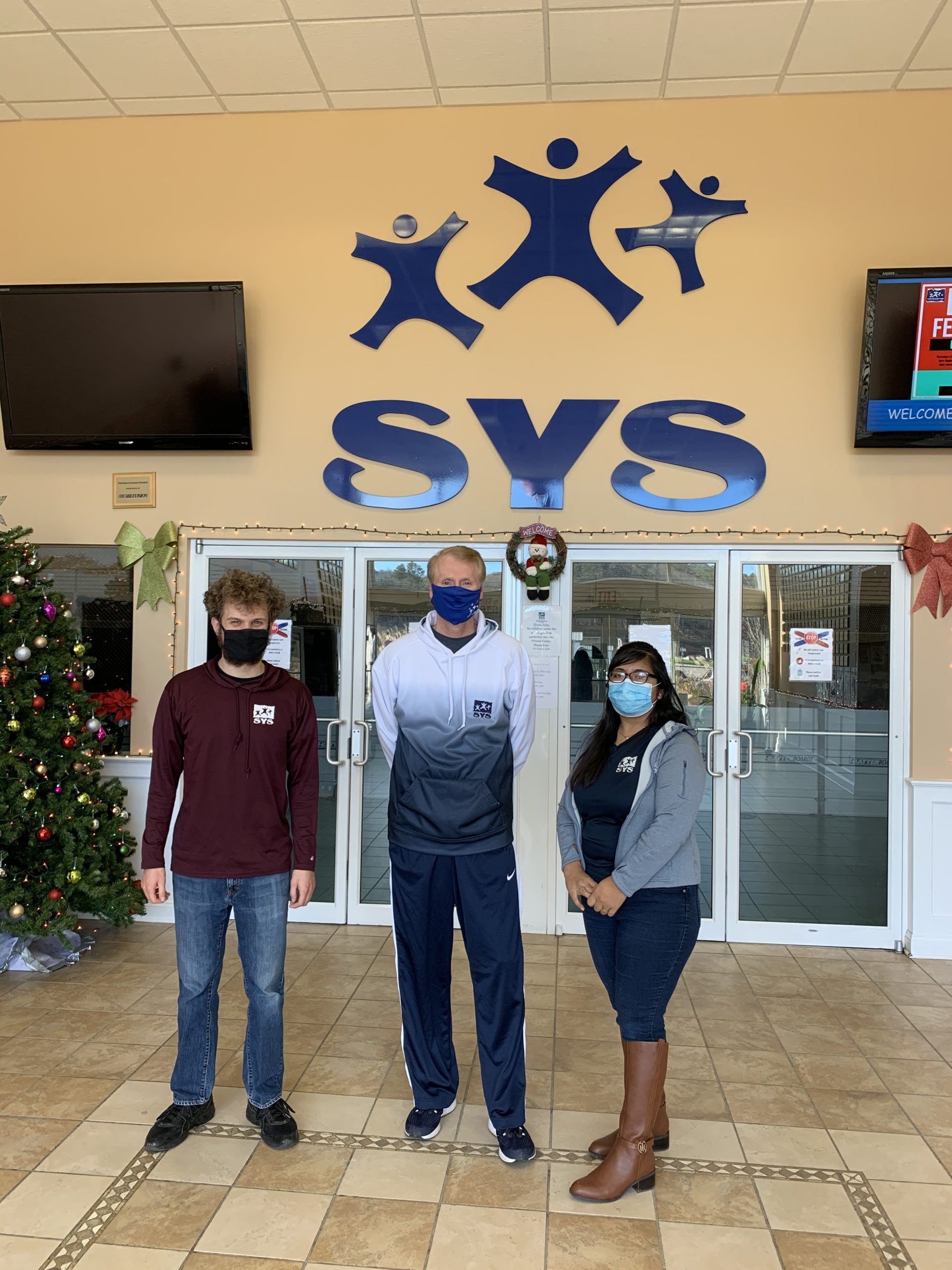 Evan Gravano, Scott Johnson, and Amairani Hernandez, staff members at Southampton Youth Services worked together to help save the life of a man who collapsed while playing pickle ball at the recreational center on November 30.