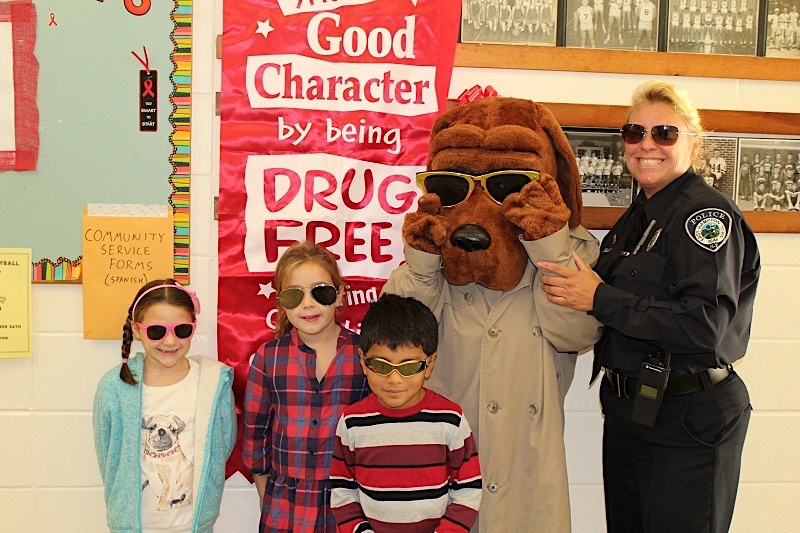 East Hampton Town Police Officer Kim Notel has participated in multple Red Ribbon Week events at Springs School, teaching students with her canine detective friend McGruff, the importance of drug abuse prevention. 