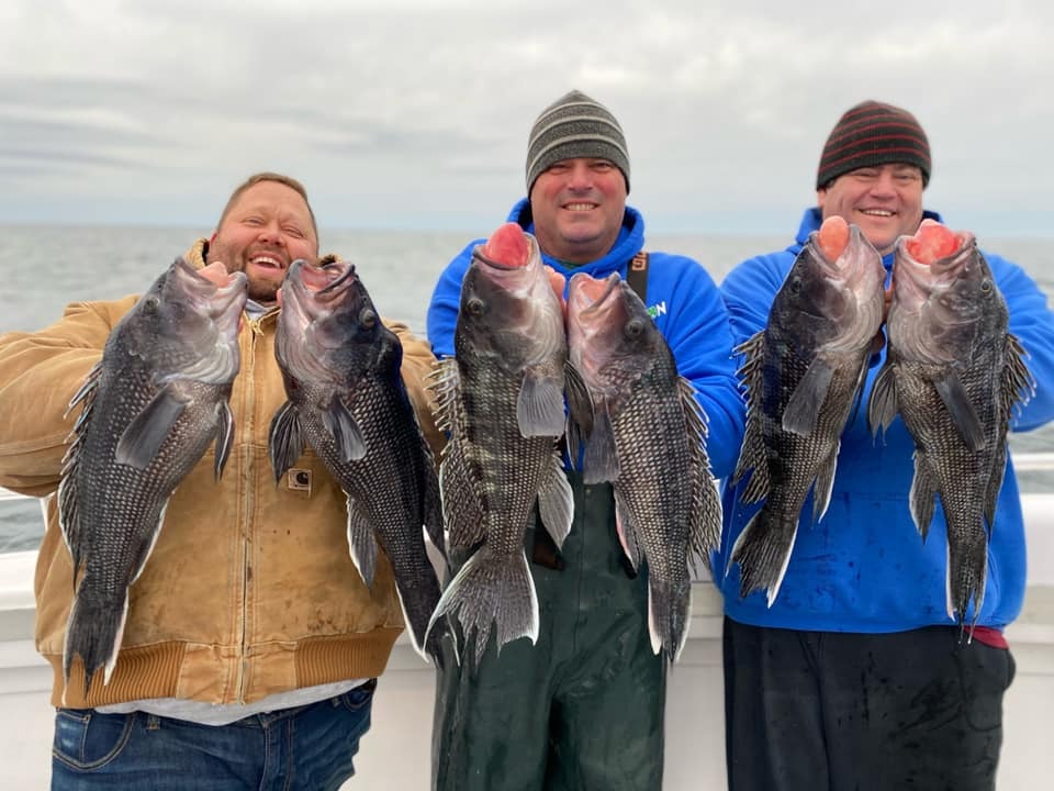 Big smiles abound on the Hampton Lady for black sea bass fishing lately. 