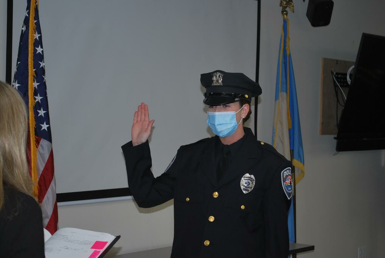 Shannon Merker takes the oath of office, becoming one of the newest members of the Southampton Town Police Department. COURTESY STPD. 