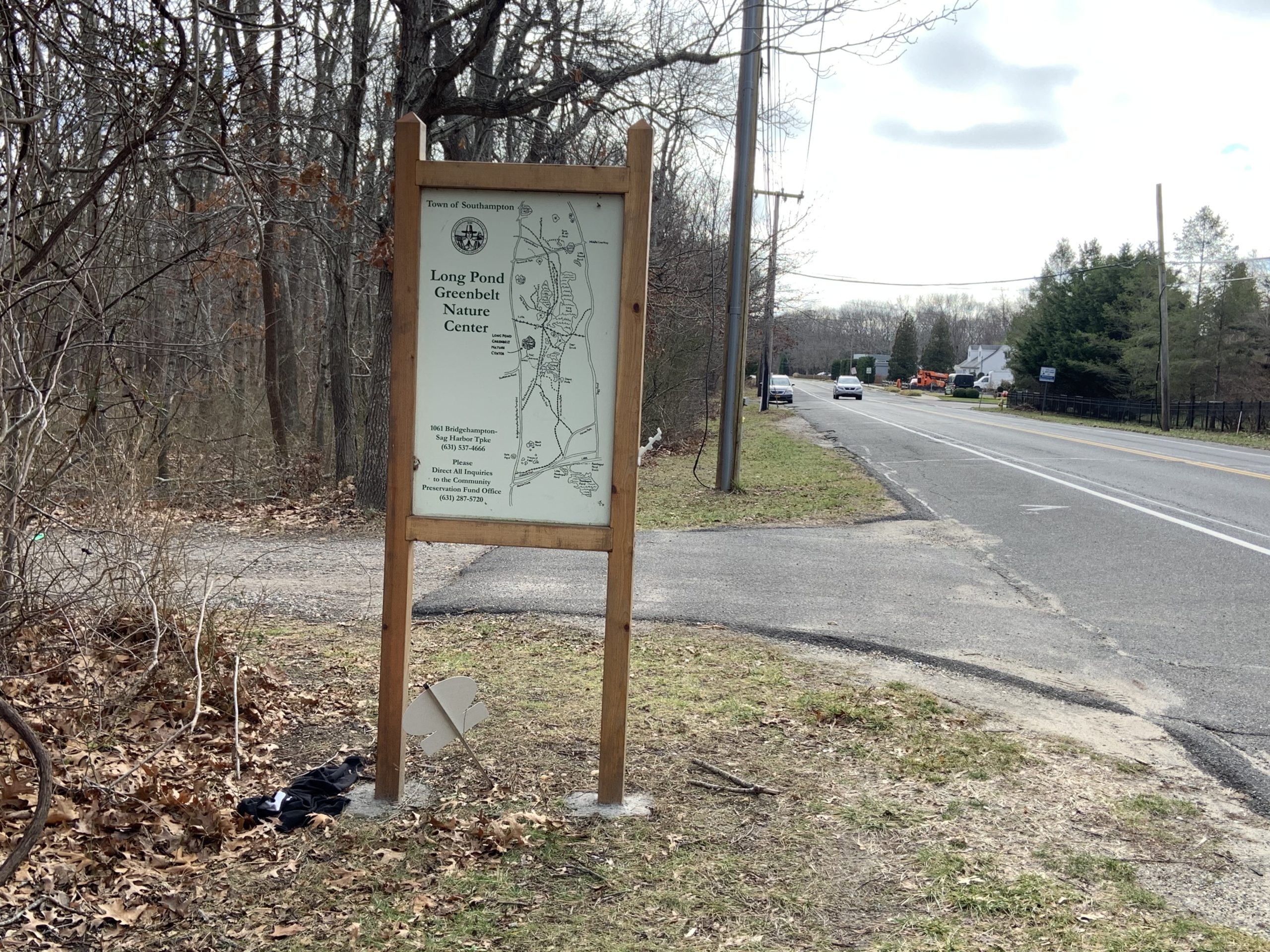 The entrance to the Long Pond Greenbelt on the Bridgehampton-Sag Harbor Turnpike is marked with a trail sign. STEPHEN J. KOTZ