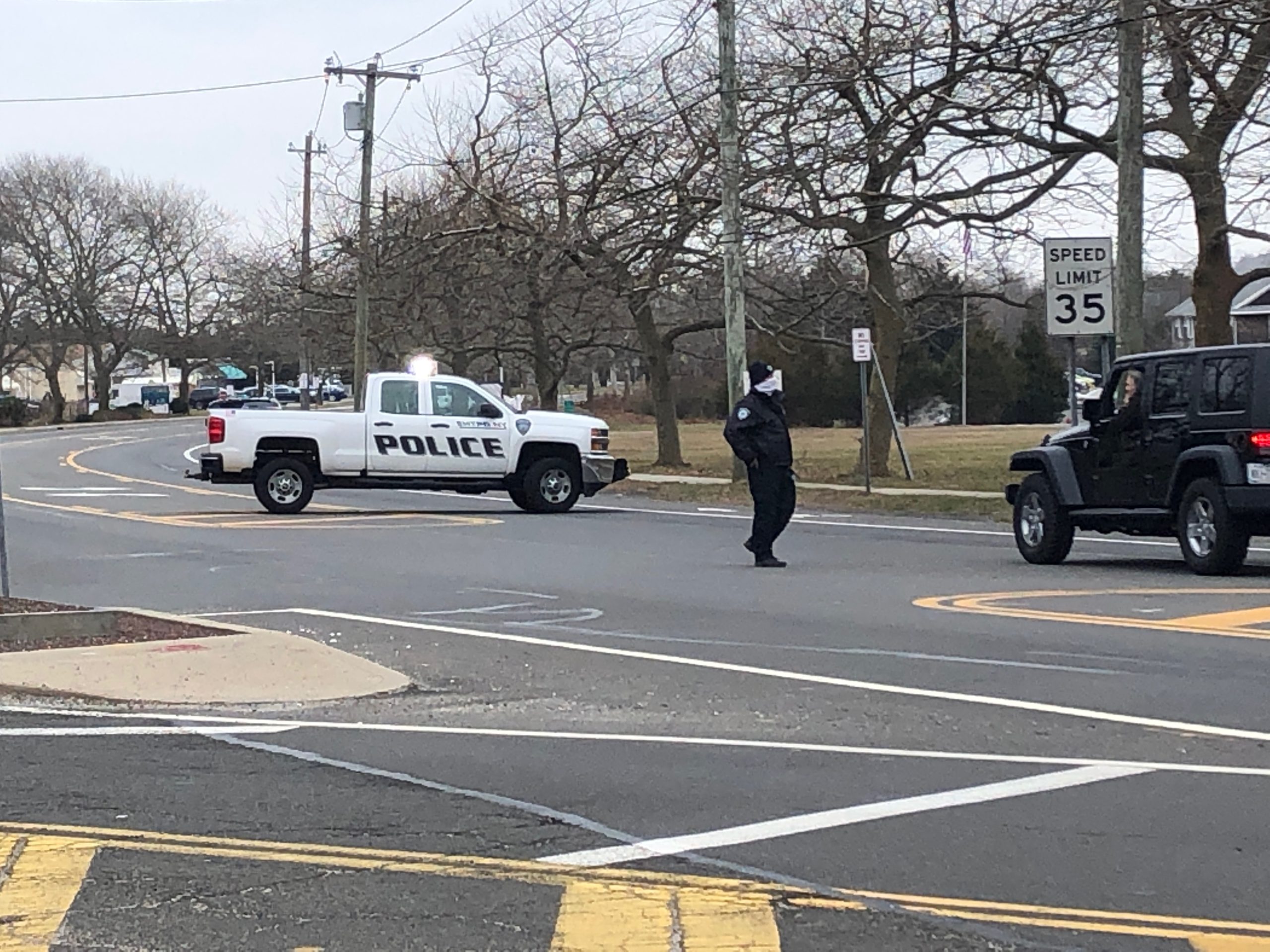 Montauk Highway is closed east of Amagansett as police are searching for a red vehicle involved in a hit-and-run Wednesday morning that sent three people to the hospital with injuries.
