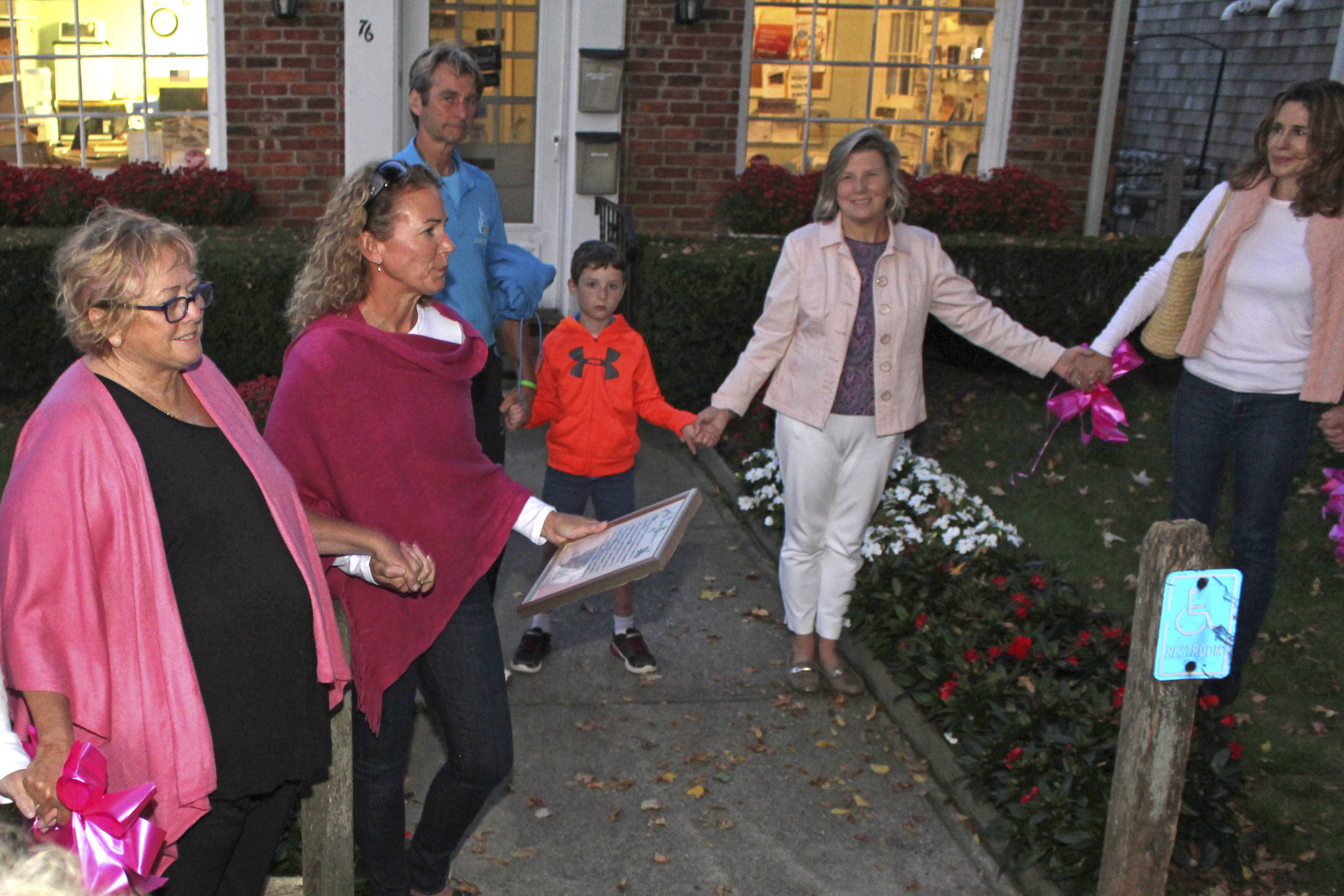 Susie Roden, far left, at the lighting of the pink tree for Breast Cancer Awareness Month in October of 2019.
