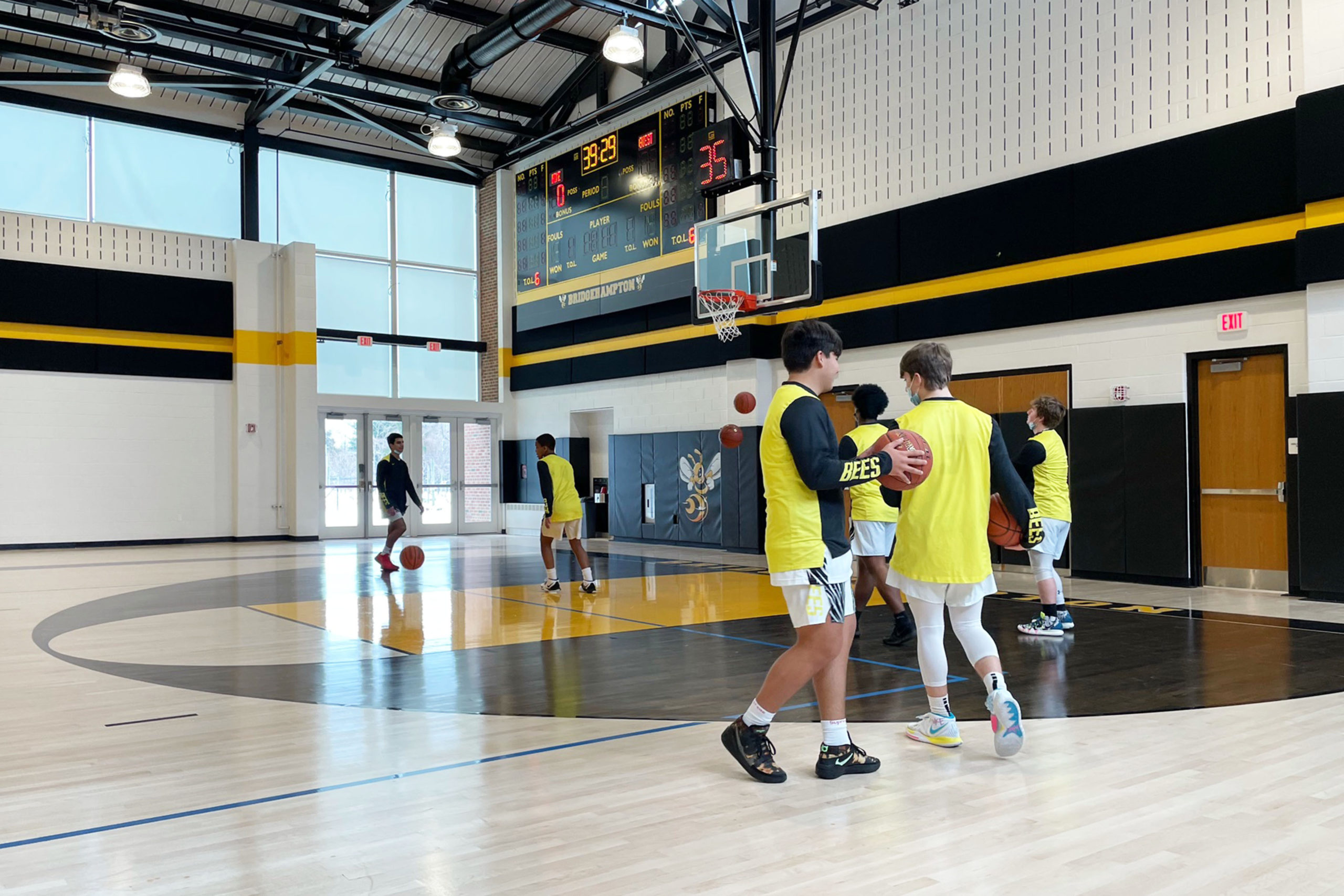 The Bridgehampton Killer Bees practice for their first game in their brand-new gymnasium on Saturday.      RON WHITE|The Bridgehampton Killer Bees practice for their first game in their brand-new gymnasium on Saturday.      RON WHITE