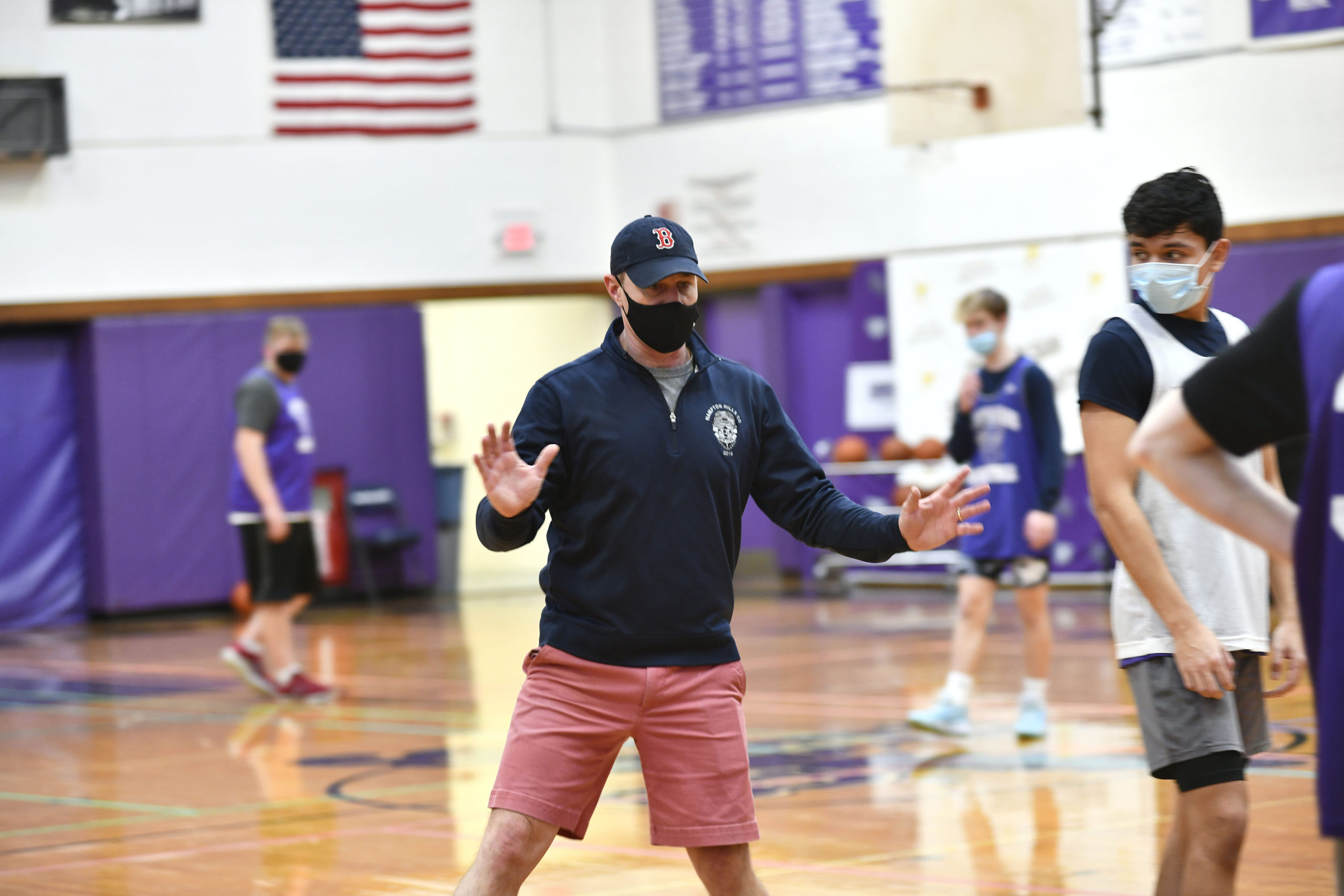 Noah Brown, the new head coach of the Hampton Bays Baymen basketball, team directs practice on Saturday morning.         DANA SHAW