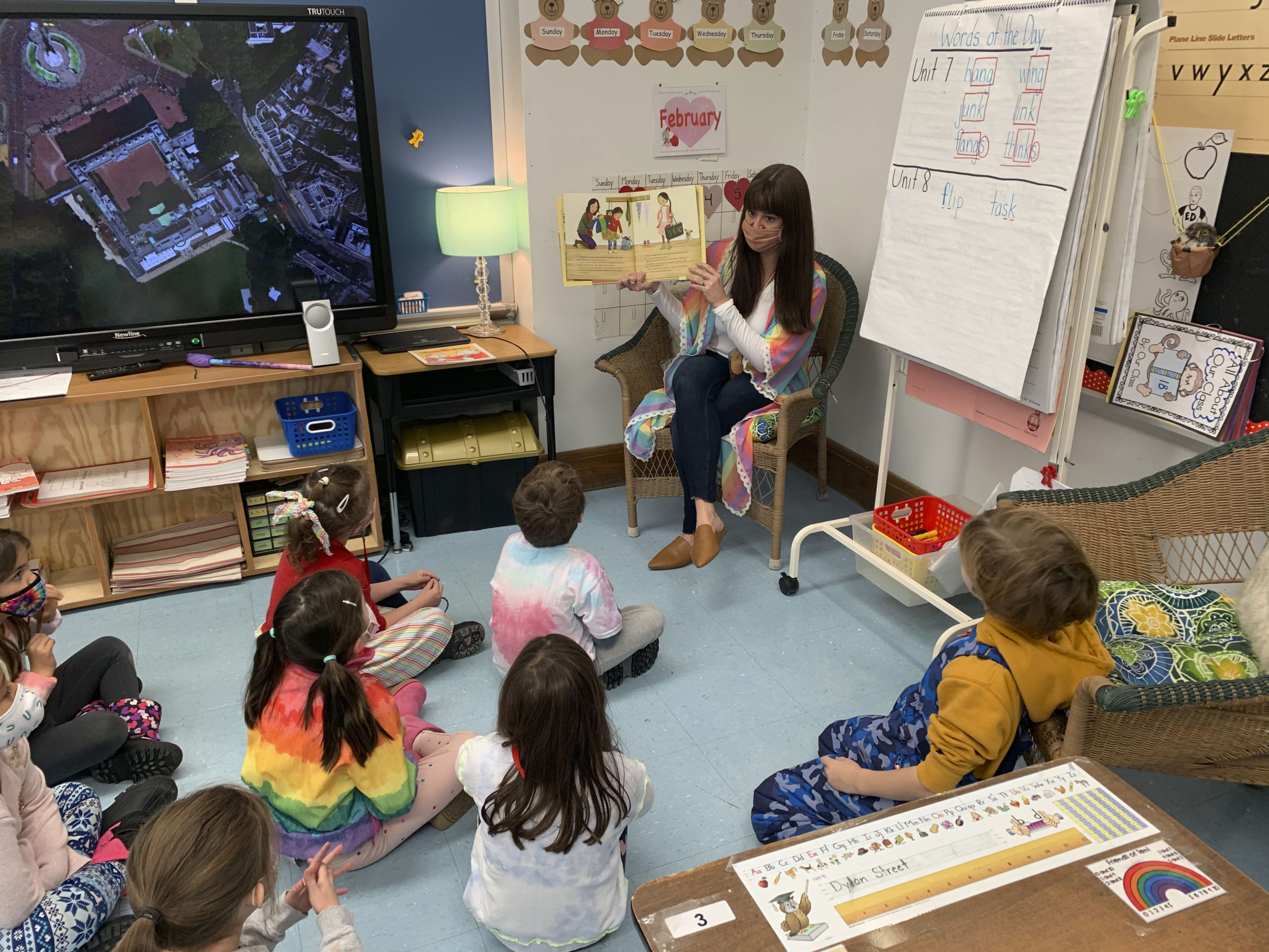 Sag Harbor Elementary School first-grade teacher Katy Berkoski reads the book “Sparkle Boy,” by Lesley Newman, to her class. The book came to her classroom as part of a collaboration between the school’s Diversity and Inclusion Committee and John Jermain Library.