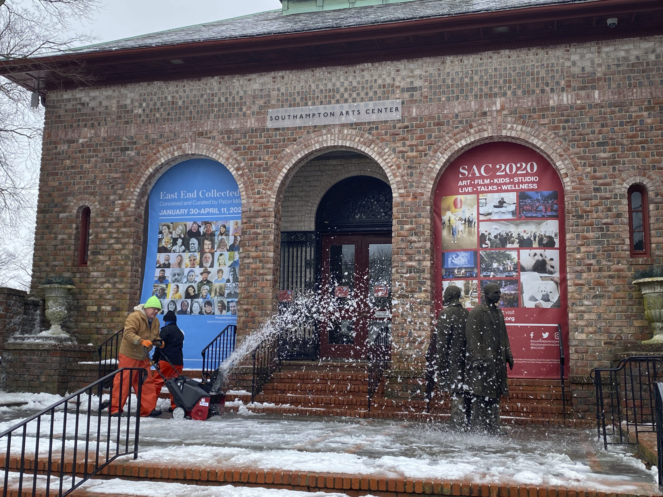 Southampton Village crews dig out the Southampton Arts Center on Tuesday morning.  DANA SHAW