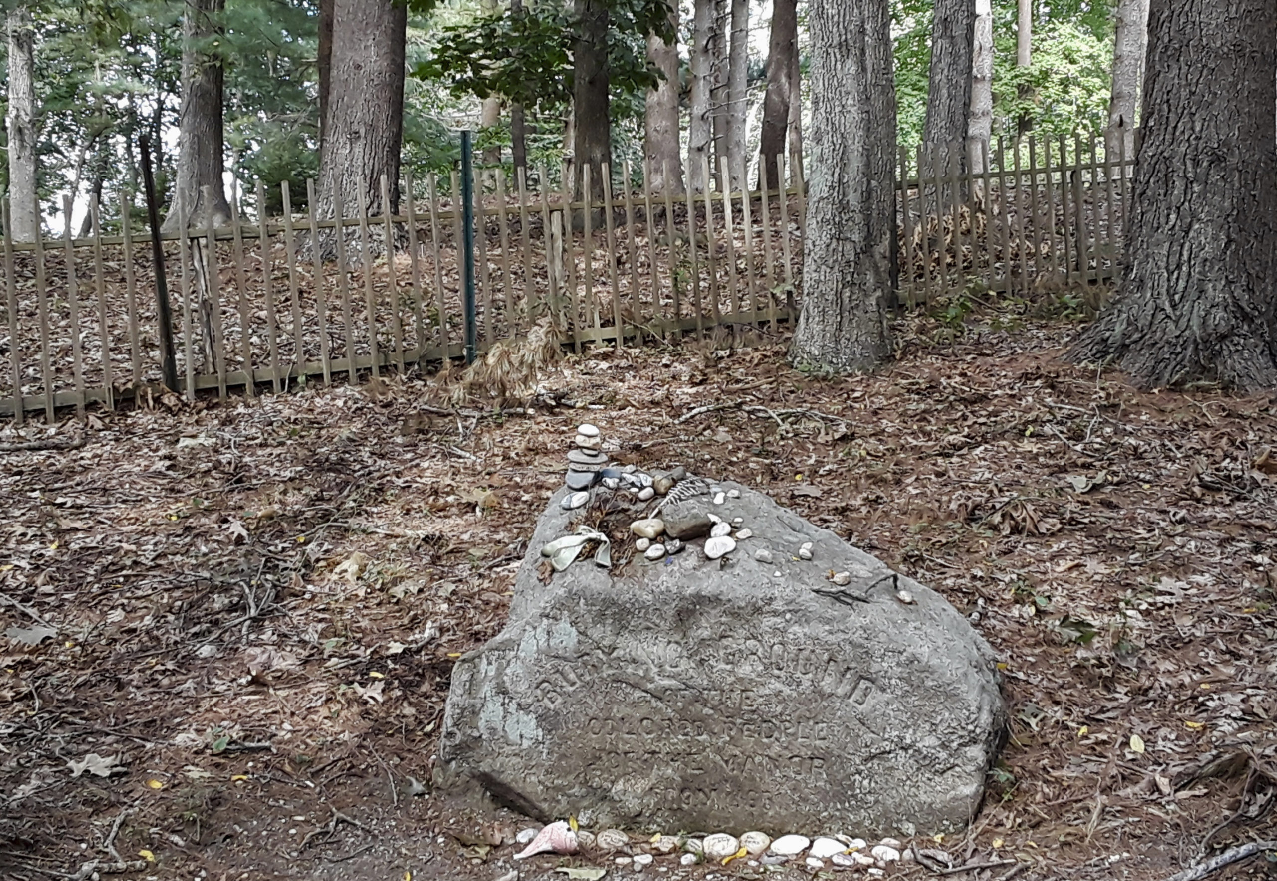 The Stone commemorating the Afro-Indigenous Burial Ground at Sylvester Manor where there may be up to 200 persons are buried. The stone reads, 
