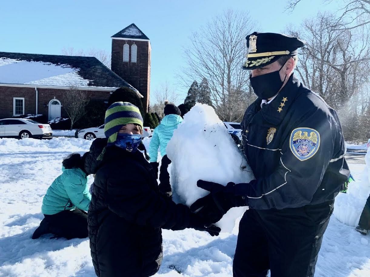 Members of the Quogue Police Department join children and staff for a day of outdoor fun at the Quogue Elementary School.
