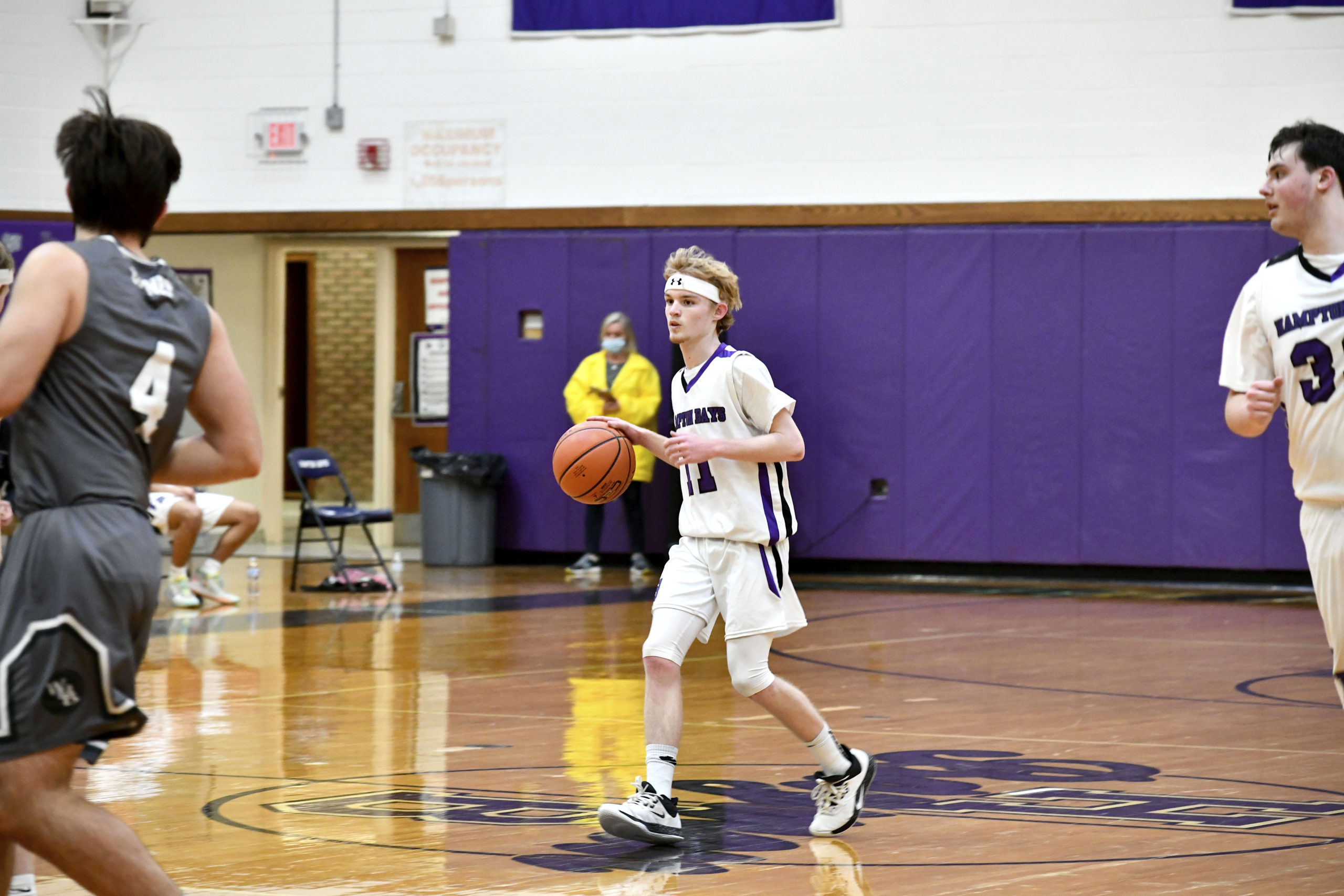 Hampton Bays senior point guard Jack McNamara carries the ball into play.    DANA SHAW