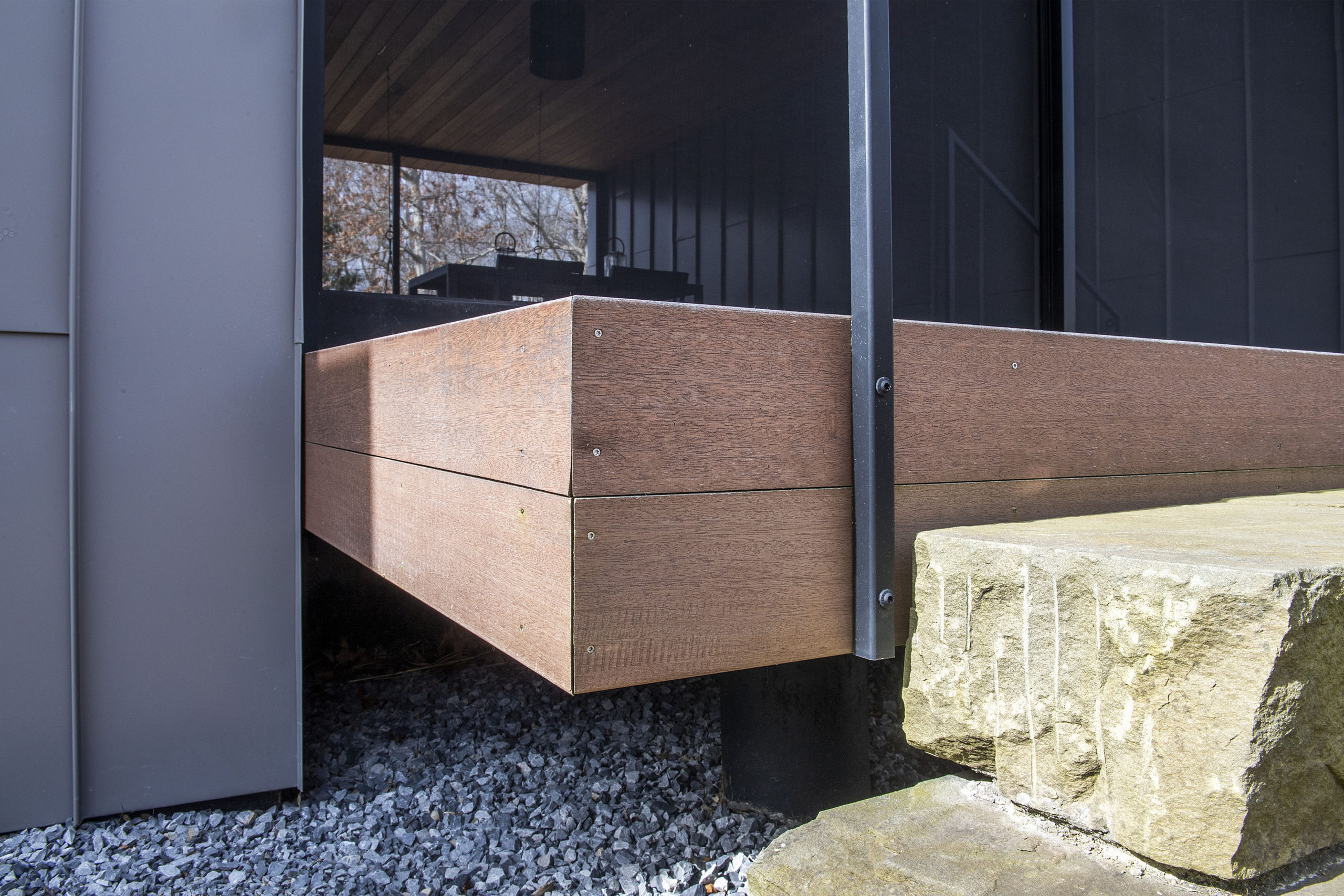 Mahogany decking and bluestone steps.