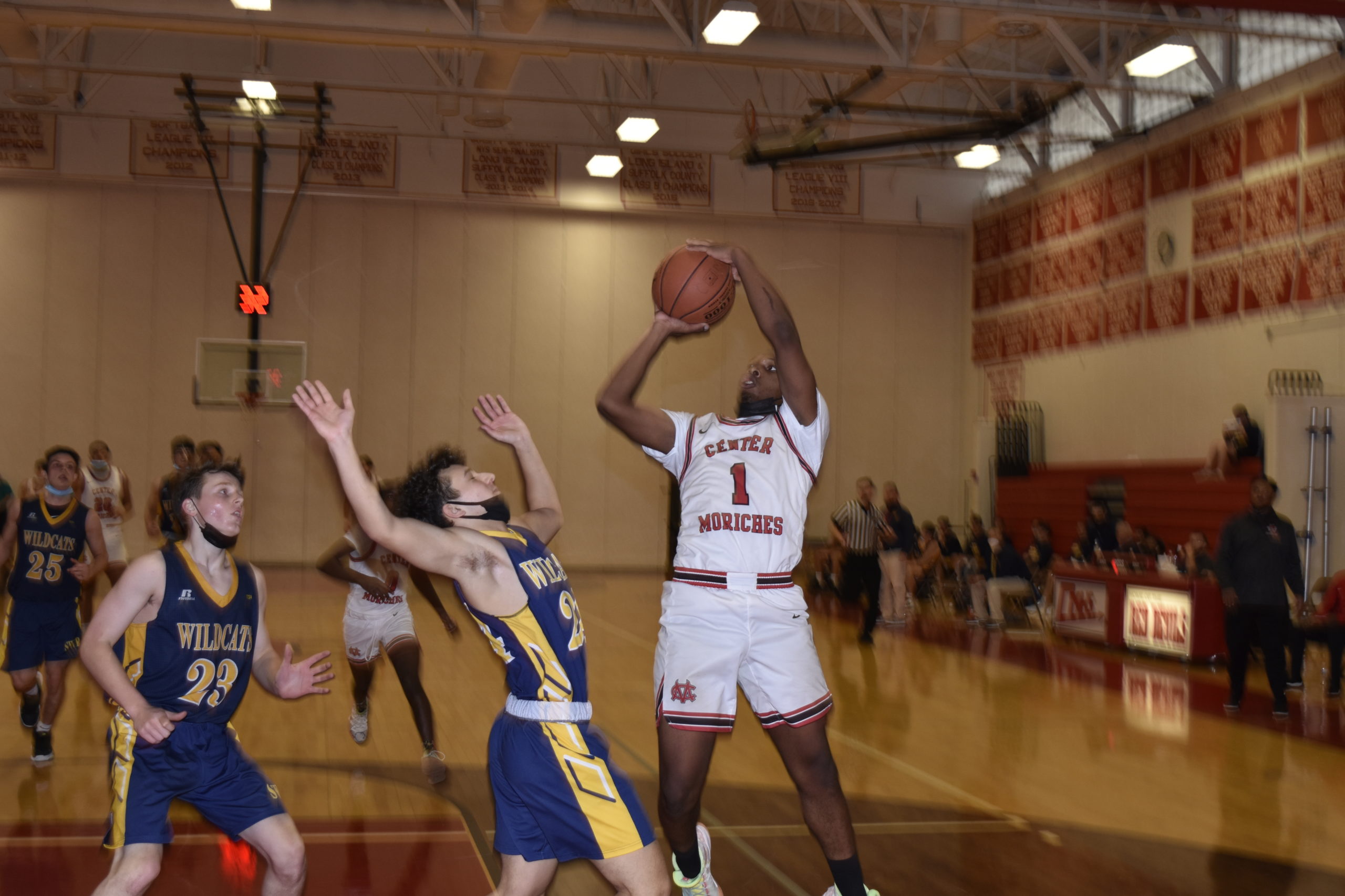 Junior C.J. Brackett scored 12 points off the bench in the Red Devils' 76-61 victory over Shoreham/Wading River on Sunday.