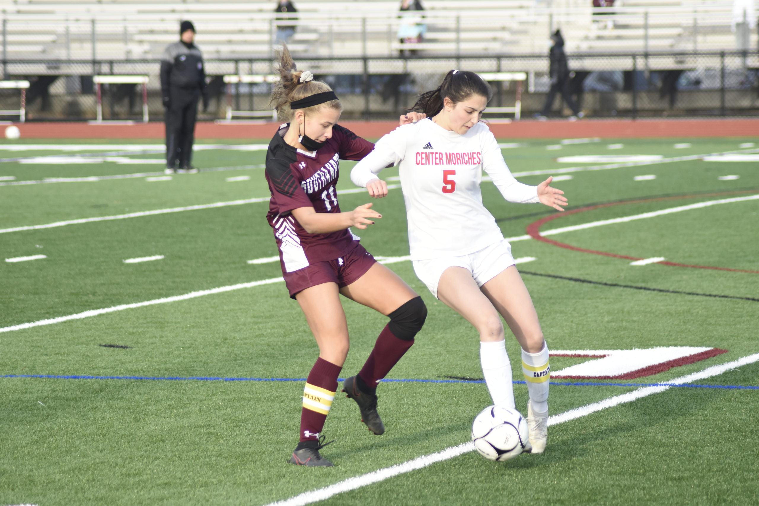 Southampton junior co-captain Charlotte Cardel pressures a Center Moriches player.