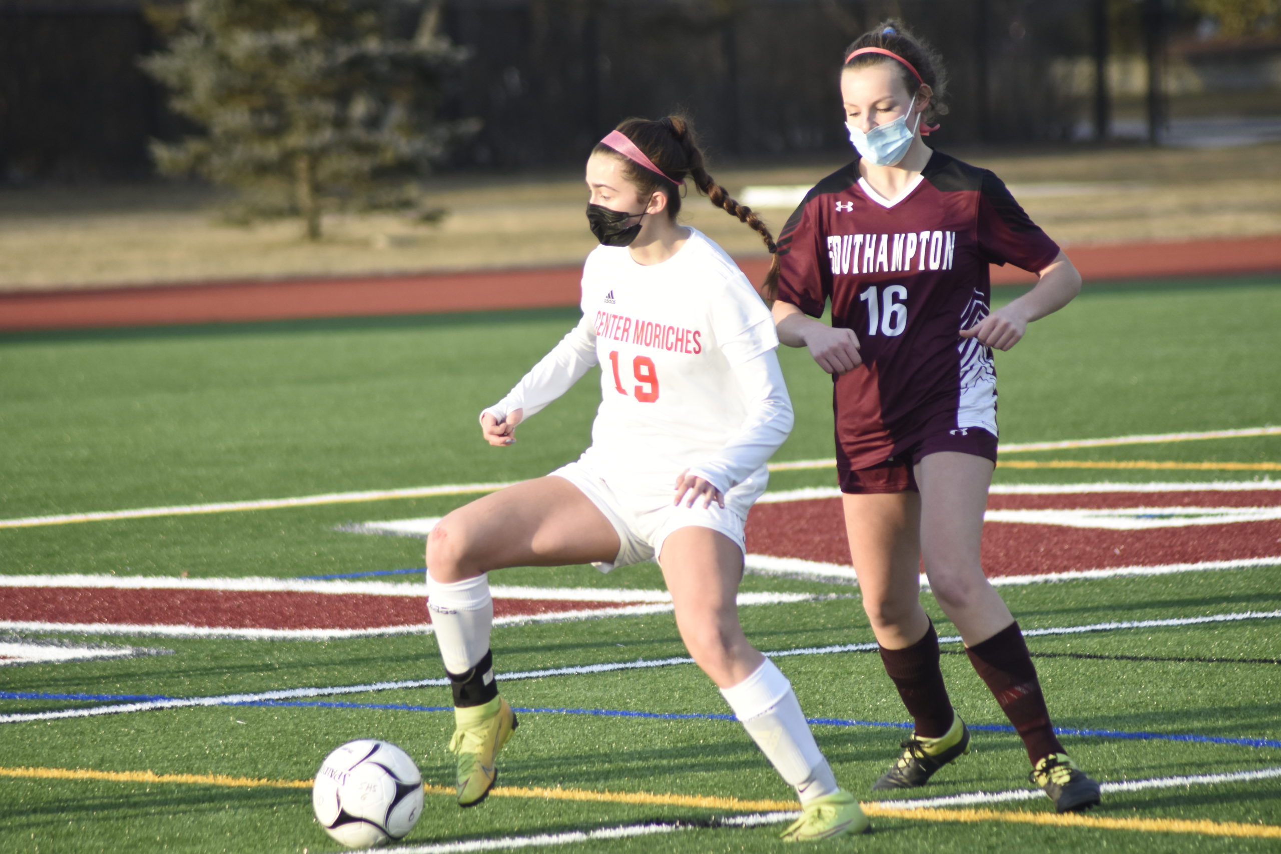 Southampton junior Caroline Luss pressures a Center Moriches player.