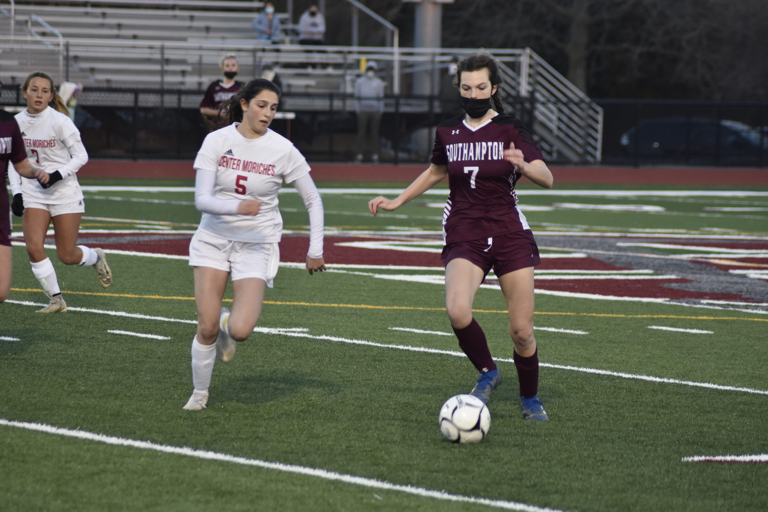 Southampton sophomore Hailey Cameron moves the ball at midfield.