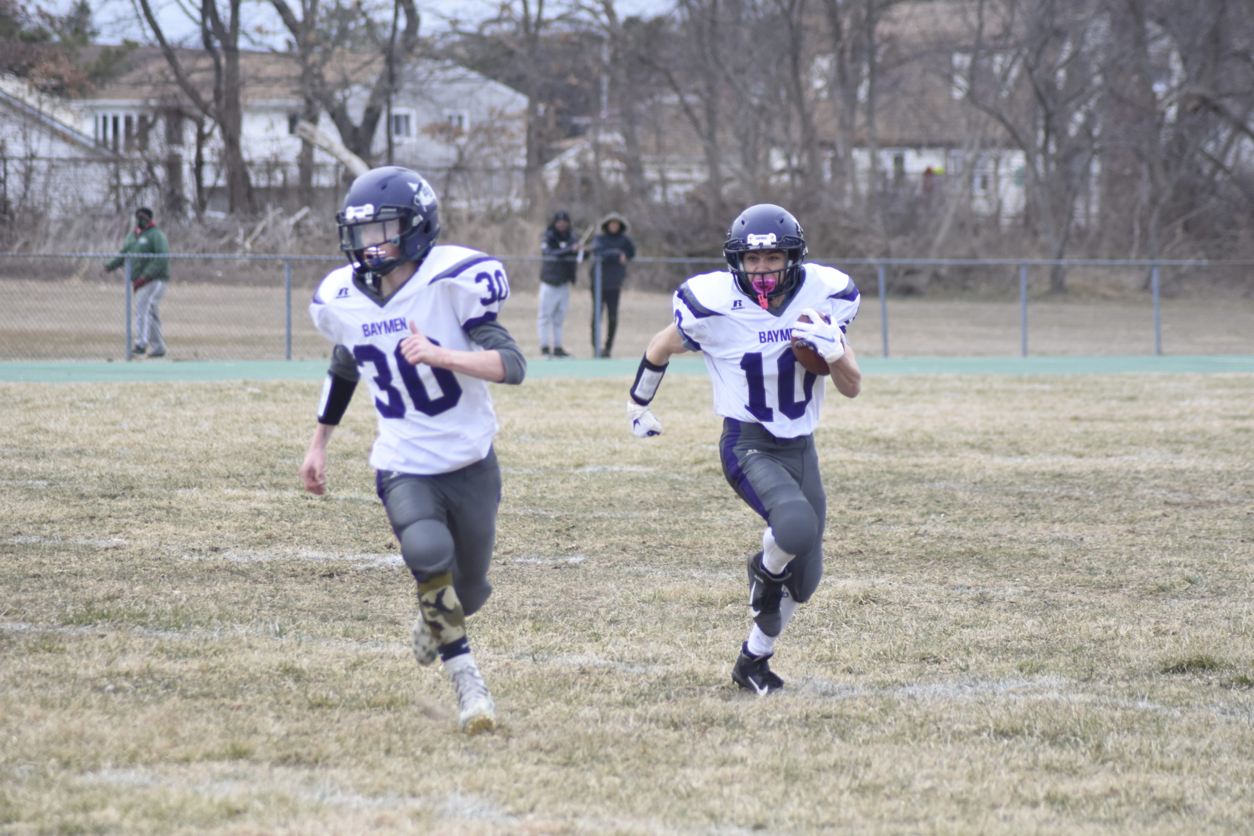 Hampton Bays senior Thomas Fassino has open room with aide from lead blocker and fellow senior Jake Tuttle.