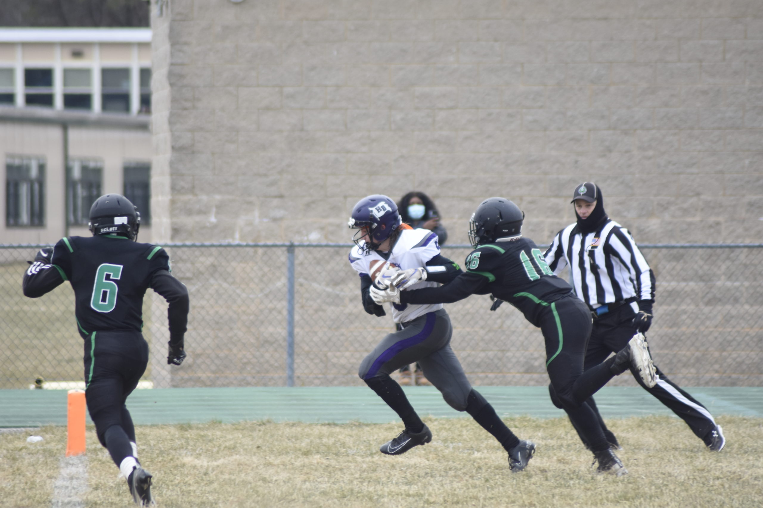 After hauling in a deep pass from senior quarterback Jack McNamara, senior Mickey Bracken gets loose from a Wyandanch defender and scores a touchdown.