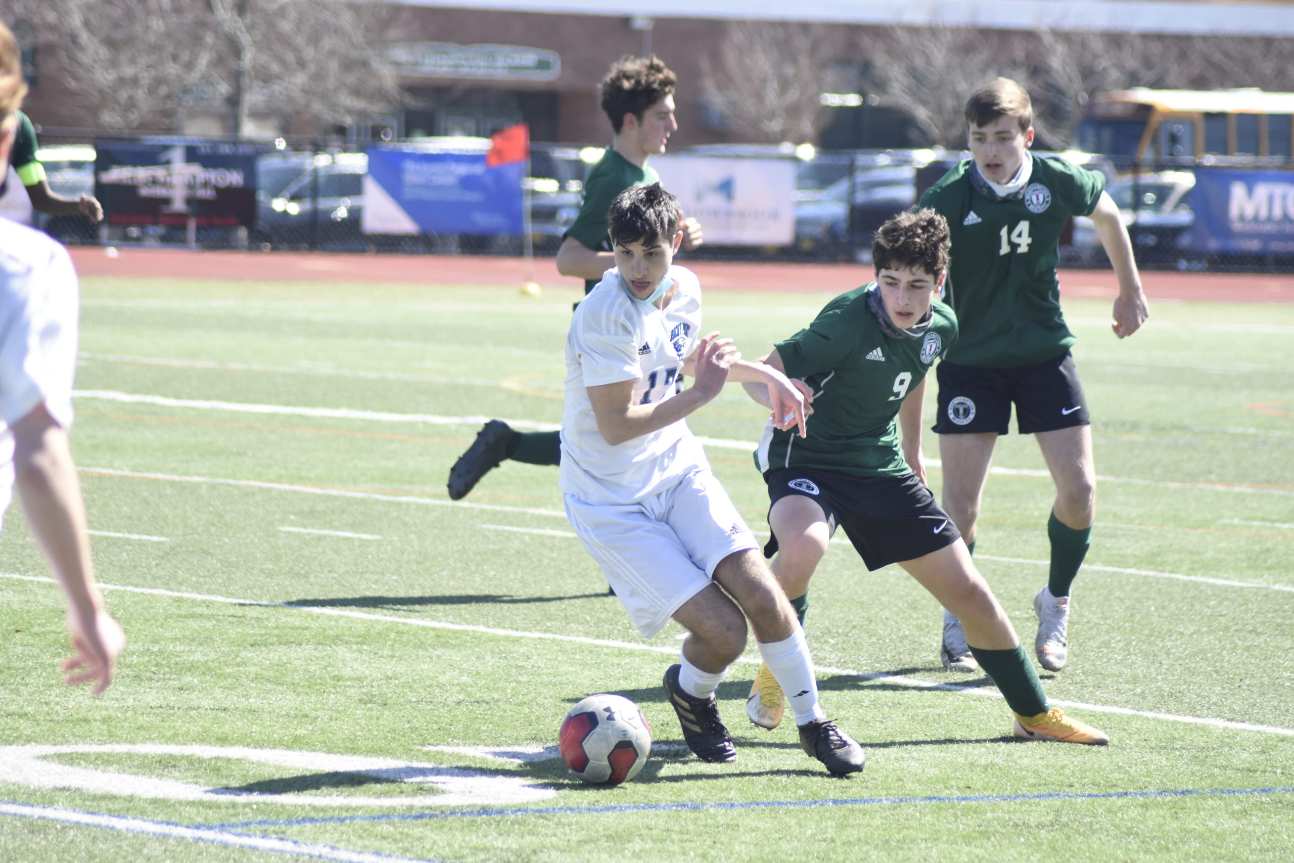 Westhampton Beach junior Loris Van Vlodrop tracks a Rocky Point player.