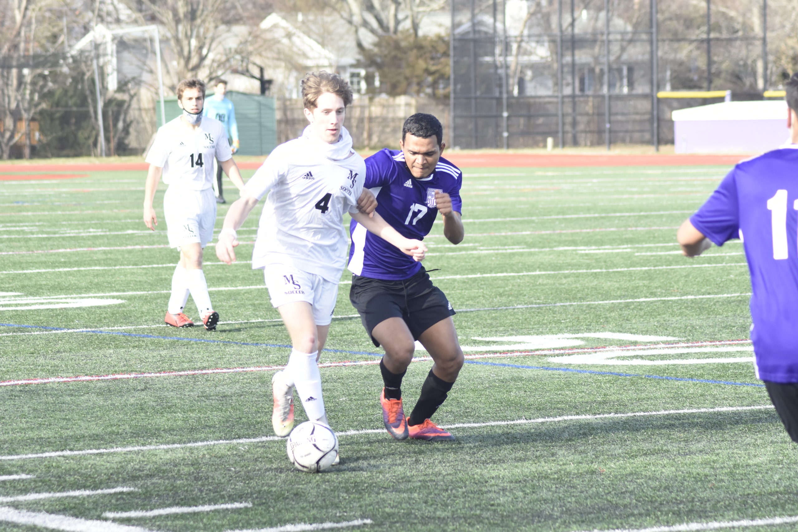 Hampton Bays senior Francisco Funez pressures a Mt. Sinai player.