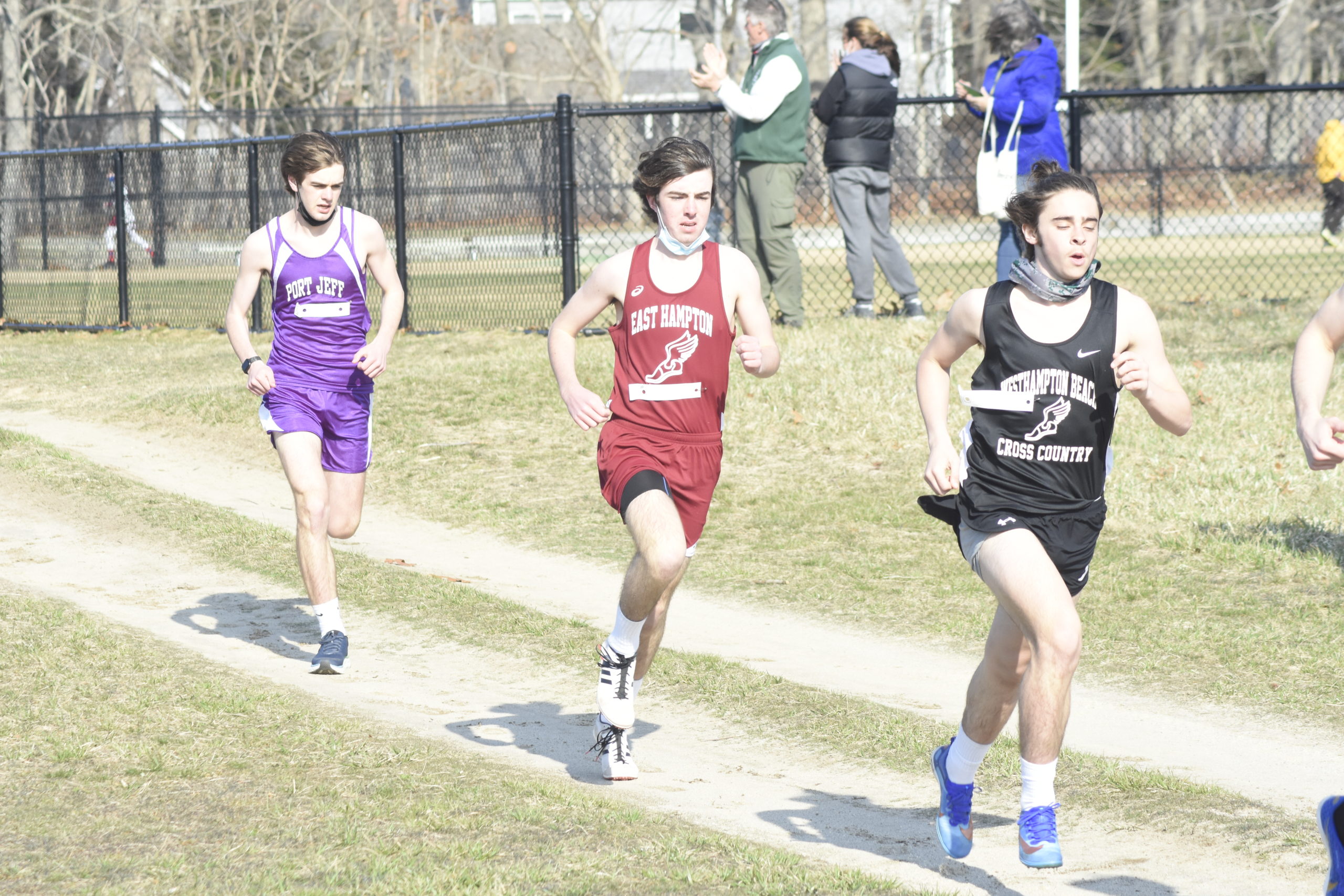 East Hampton's Liam Fowkes trails Rudy Scala of Westhampton Beach.