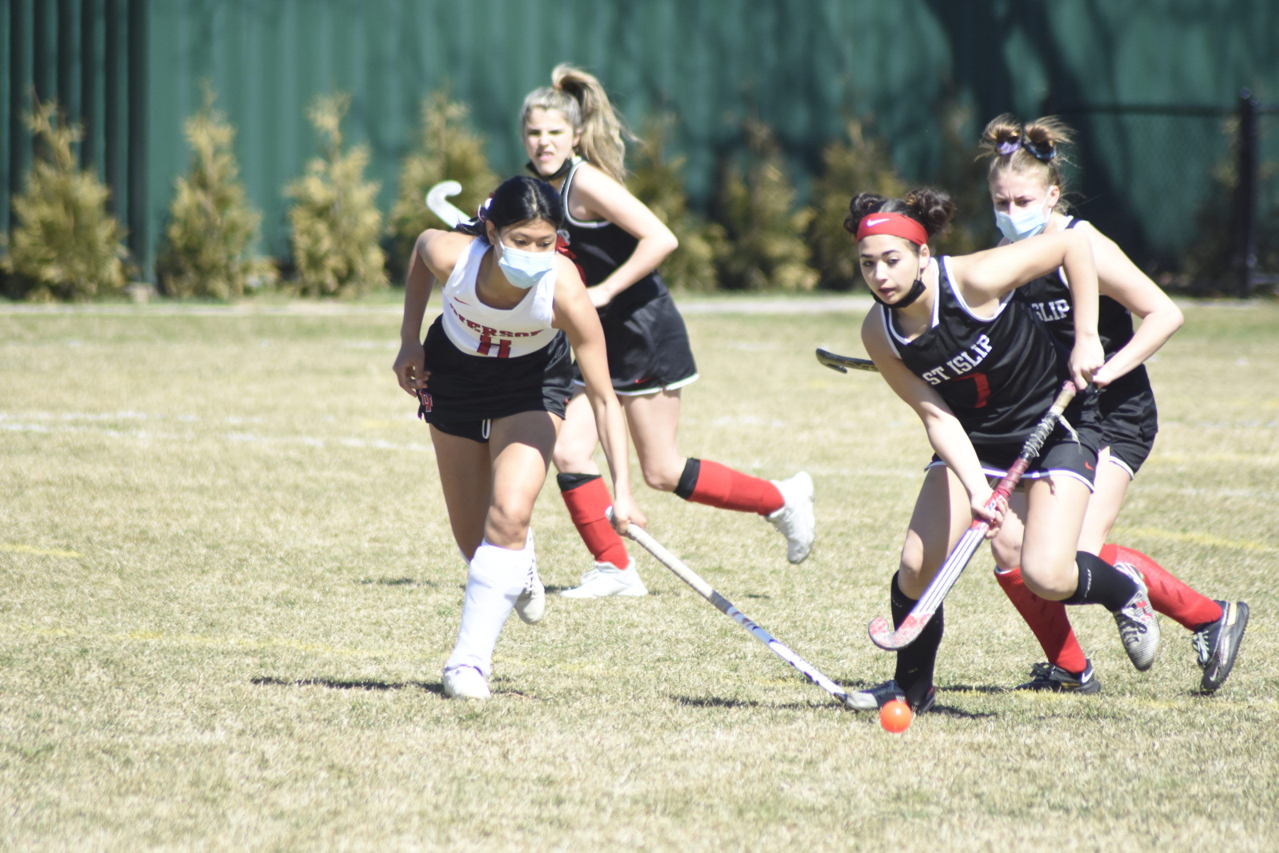 Pierson sophomore Maddie Cohen beats an East Islip player to the ball.