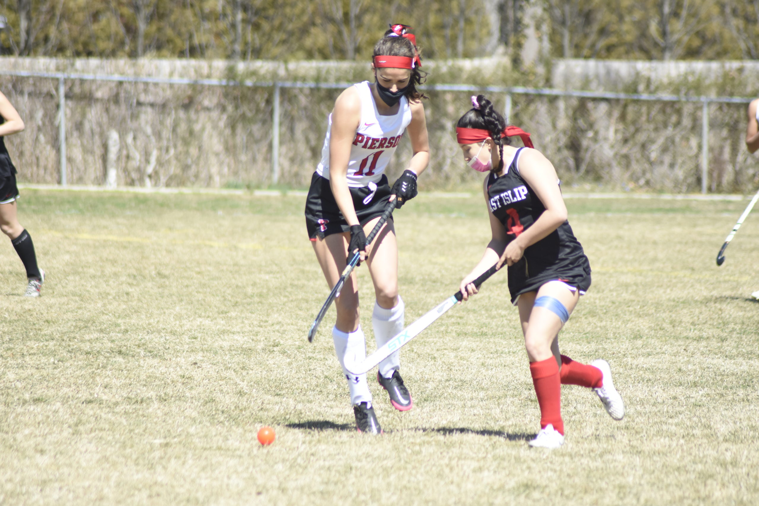 Pierson junior Meredith Spolarich controls the ball against an East Islip player.