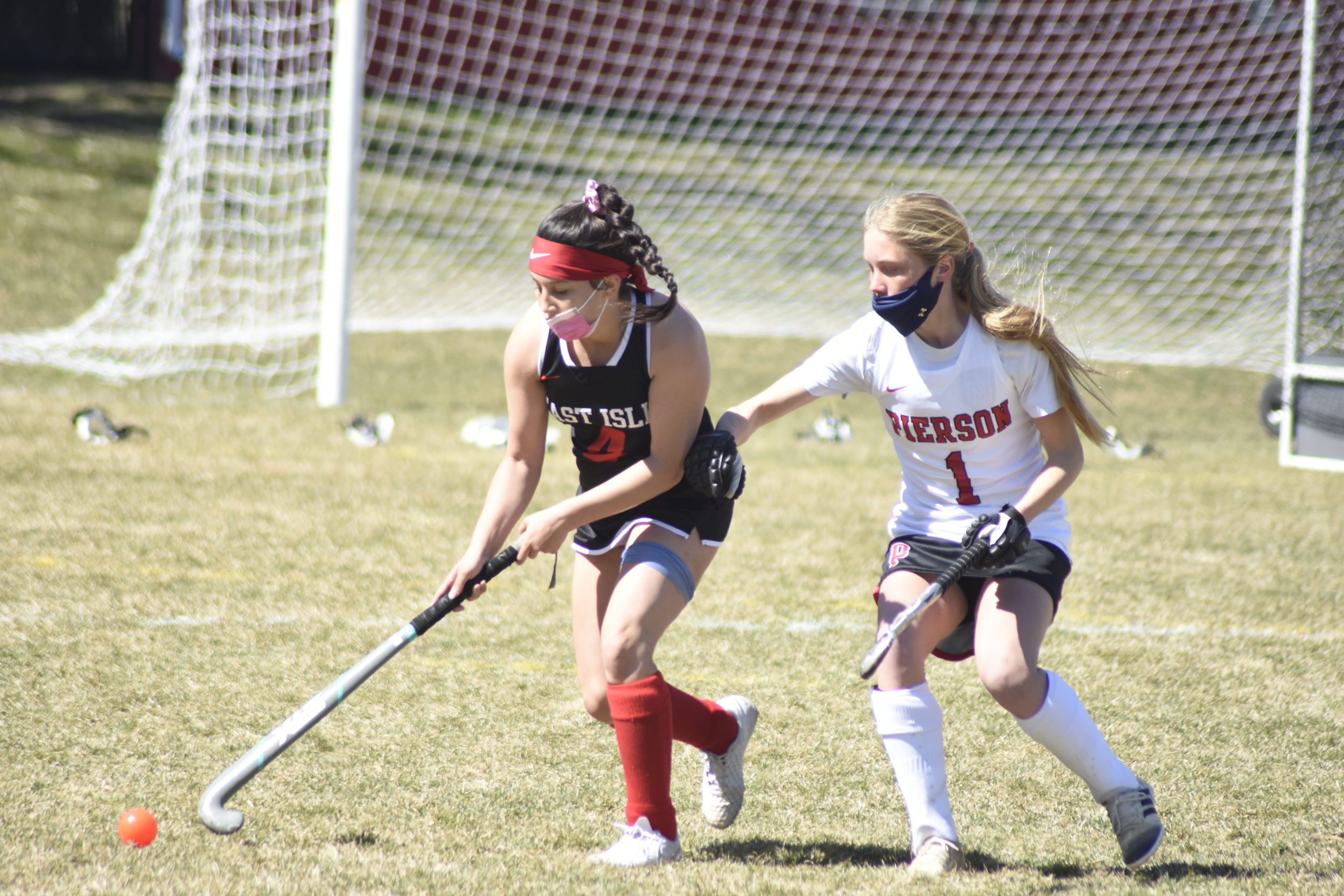 Pierson senior Brooke Esposito pressures an East Islip player.