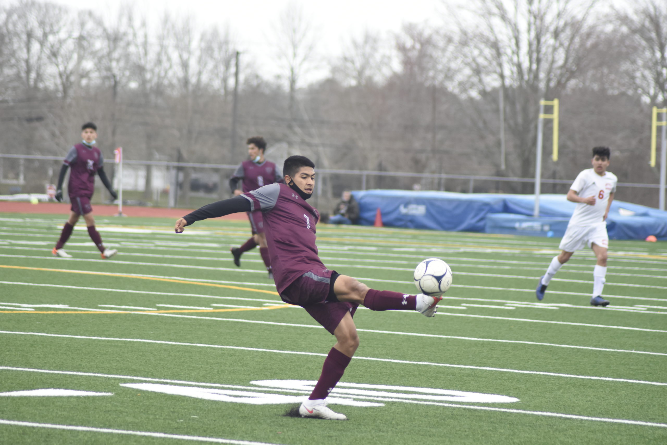 East Hampton senior Nicolas Cifuentas Diaz plays the ball on his foot.