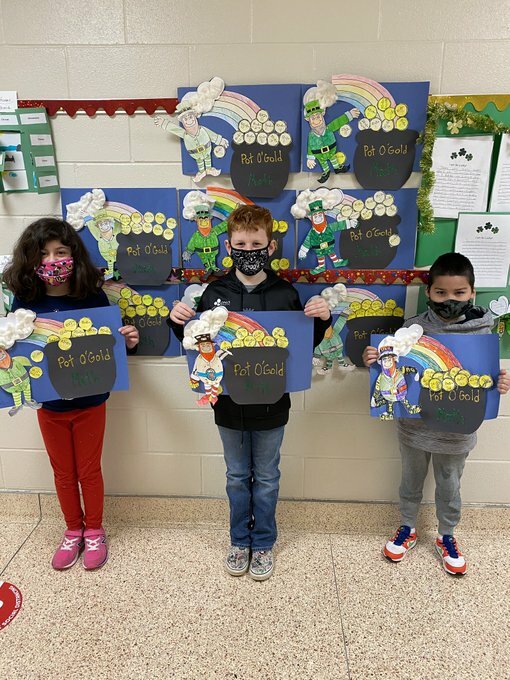 In having some St. Patrick’s Day fun, Mary O’Hanlon’s third graders at Hampton Bays Elementary School participated in a pot o’ gold math review project. The students decorated their own pots of gold with gold coins that had multiplication and division questions they had answered. Leprechauns were added, of course, for some good luck.