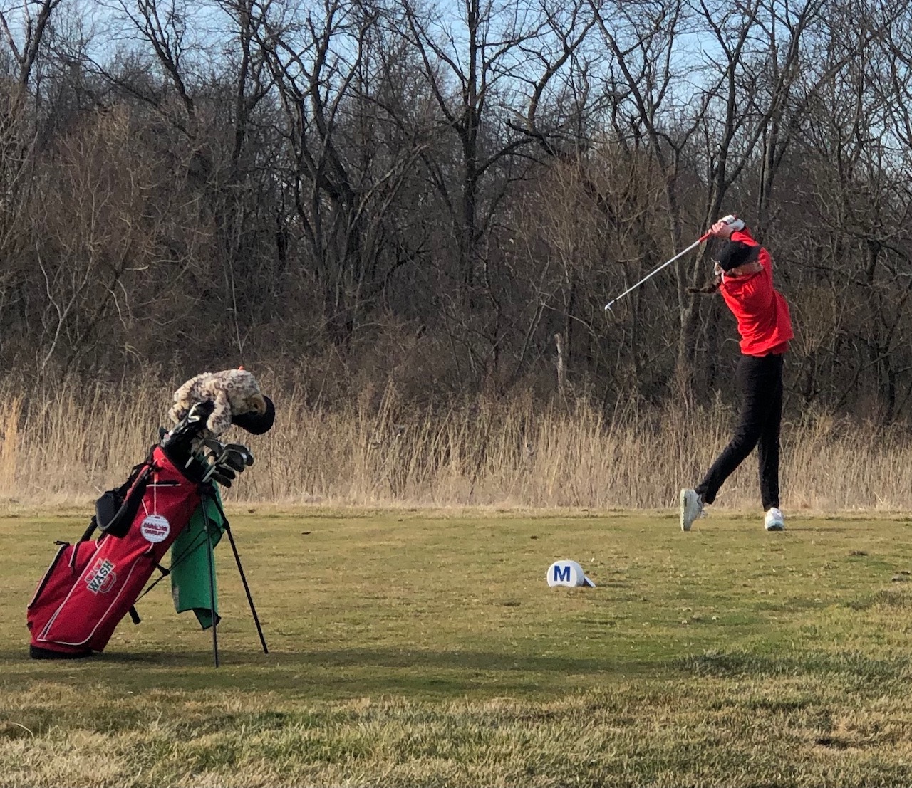 Caraline Oakley tees off at the Dechert Classic hosted by Millikin University.