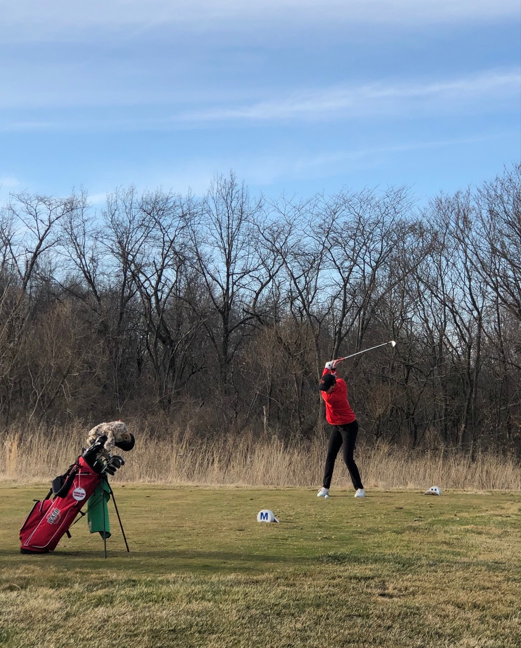 Caraline Oakley tees off at the Dechert Classic hosted by Millikin University.