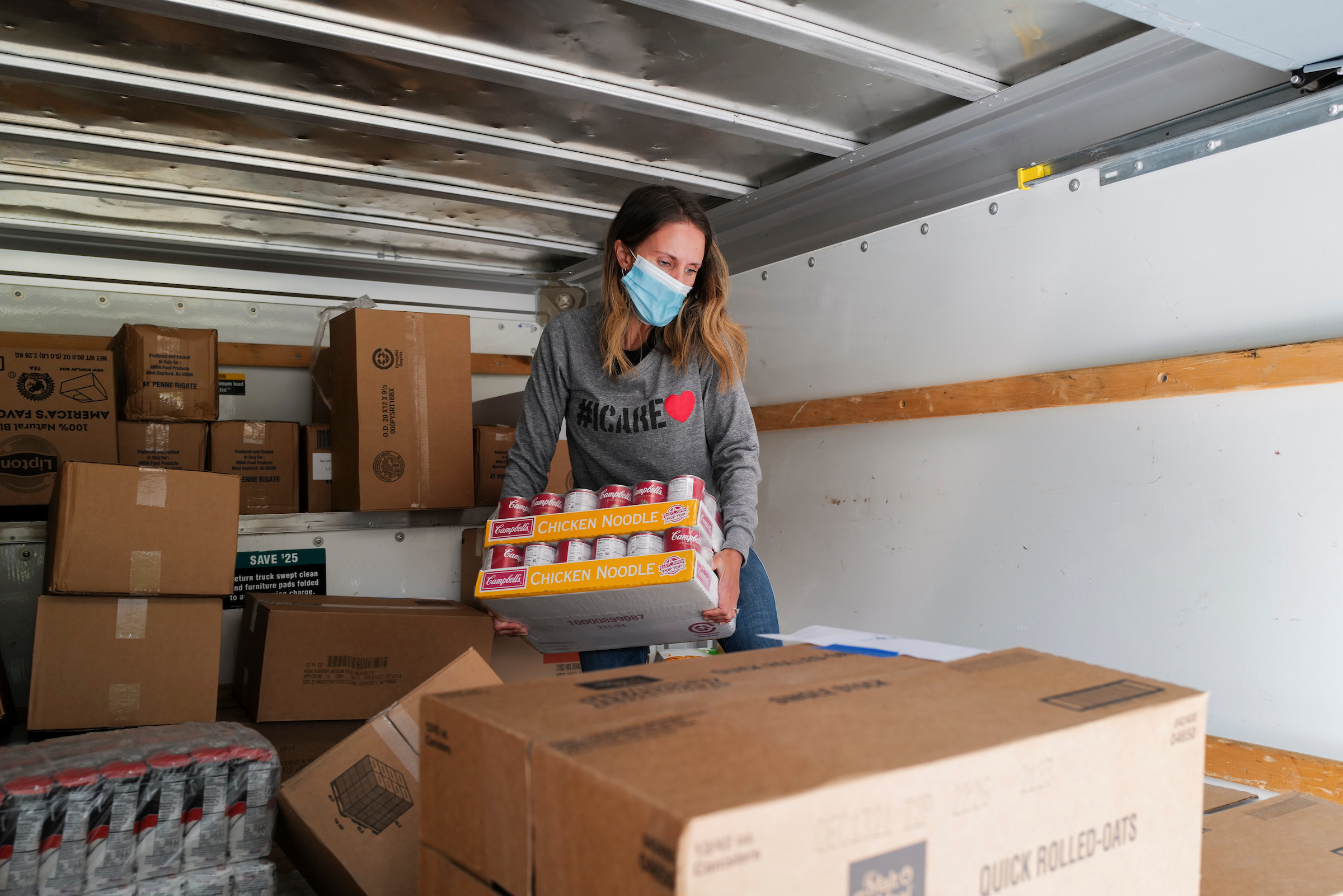 Marit Molin helps with food distribution through her organization, Hamptons Community Outreach.  LORI HAWKINS