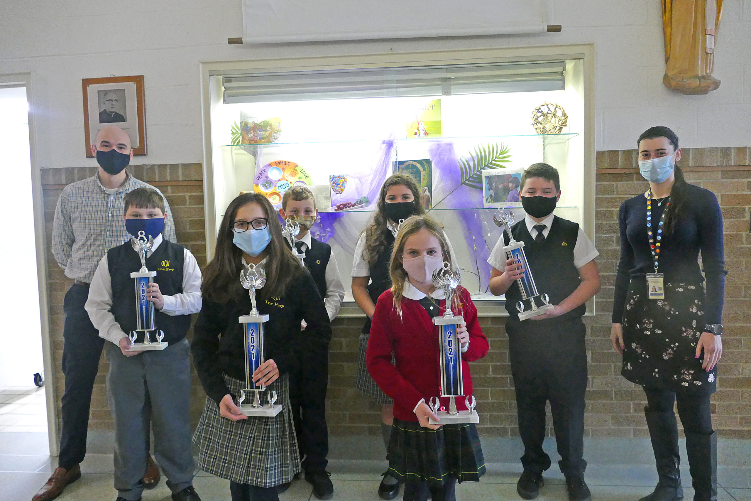 The grade level winners of the Science Shark Tank at OLH are, pictured with their teachers, Logan Robinson and Amanda Burriesci, Sofia Patrone, Bianca Alvarado, Conner McVeigh, Steven Kellis, Joseph Martin and Addison Cinelli.  COURTESY OUR LADY OF THE HAMPTONS