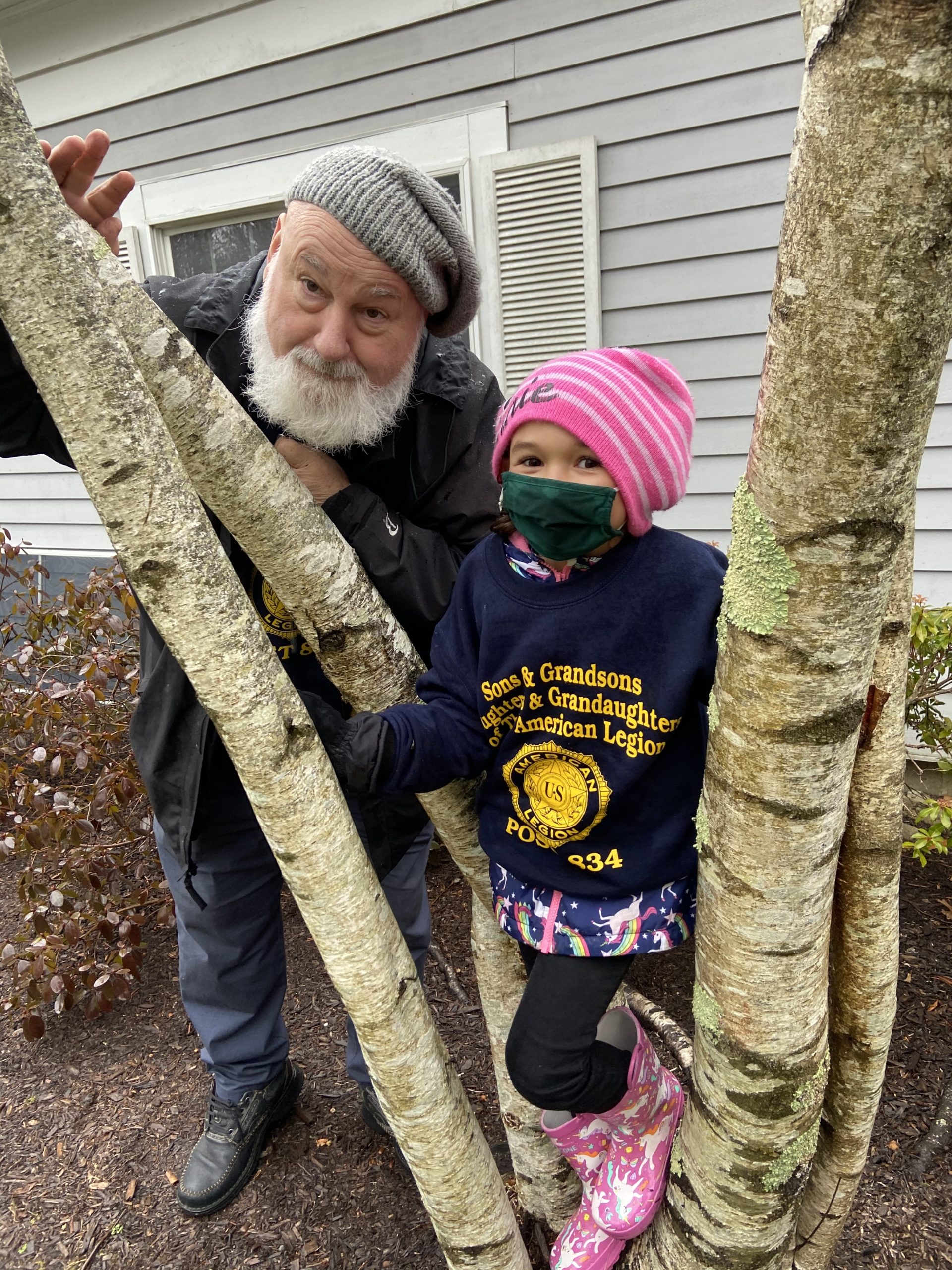 Members of the American Legion Post Post #834 in Westhampton Beach, and their children, brought bird seed and bird houses to Westhampton Care facility on February 27 and  installed them for patients there who love feeding the birds.