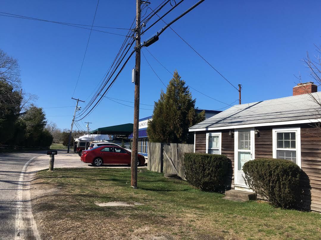 The Southampton Town Board is considering a new zoning overlay that would permit the creation of an office in the house next to Strong's Marina in North Sea.