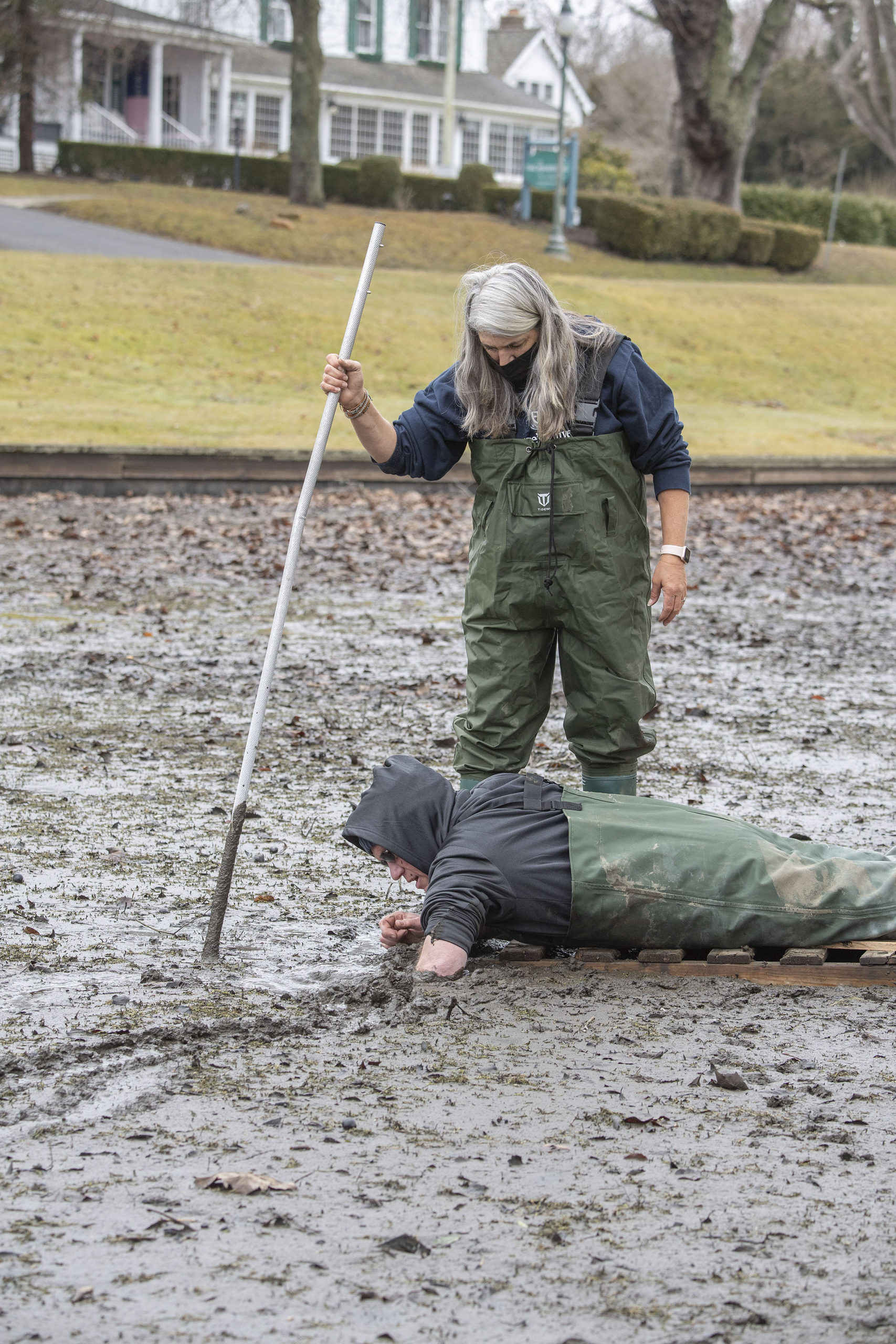 Volunteers searched Town Pond in East Hampton for hibernating turtles on Sunday.