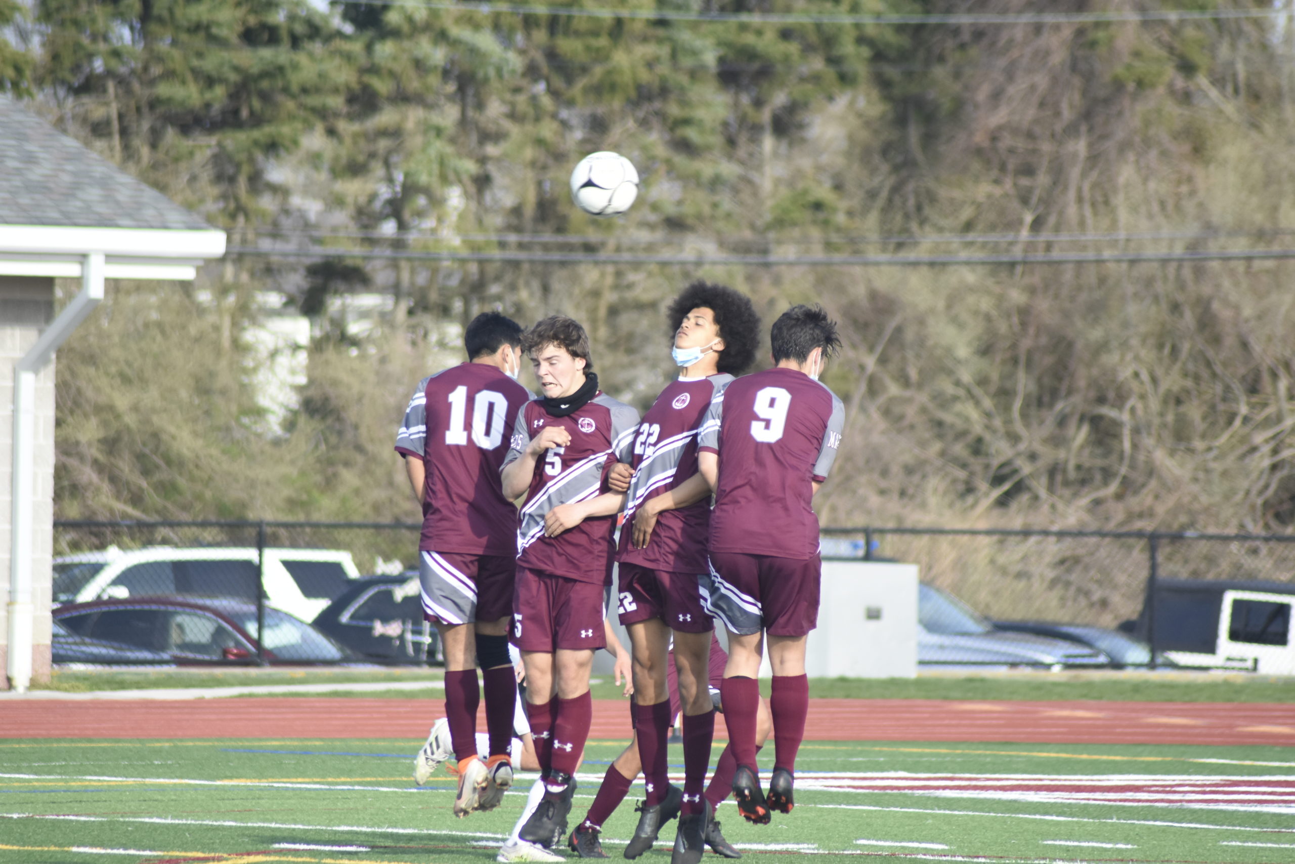 A Mariner wall of Christoffer Cozar-Rodriguez, Mason Stevens, Armani Ray and Endrit Bedrolli tries to block a free kick that sails well over them and the goal.