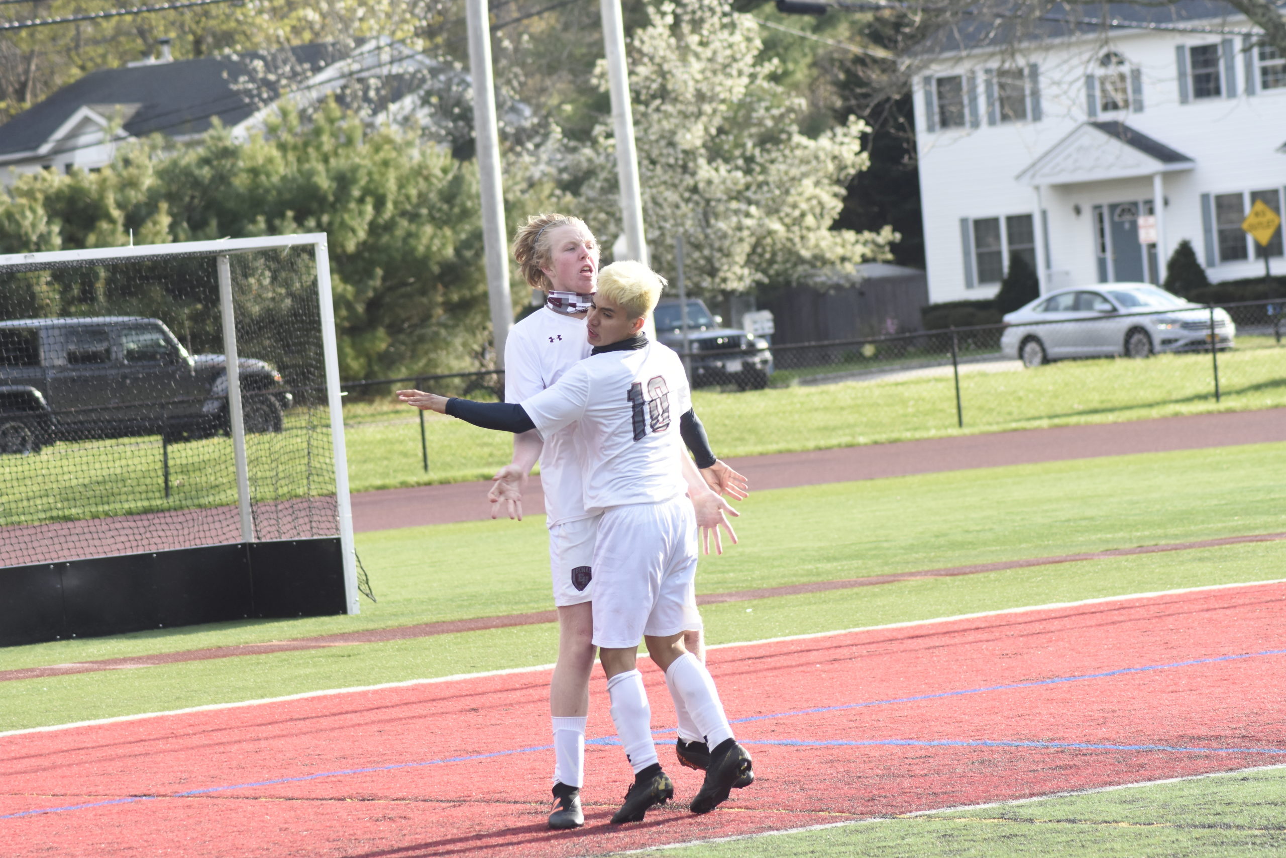 Matthew McGovern and Christopher Pintado embrace one another after McGovern's goal gave East Hampton a 3-0 lead in the Suffolk County Class A semifinal at Half Hollow Hills West. The Bonackers went on to upset Hills West, 5-1, to advance to Saturday's county championship.