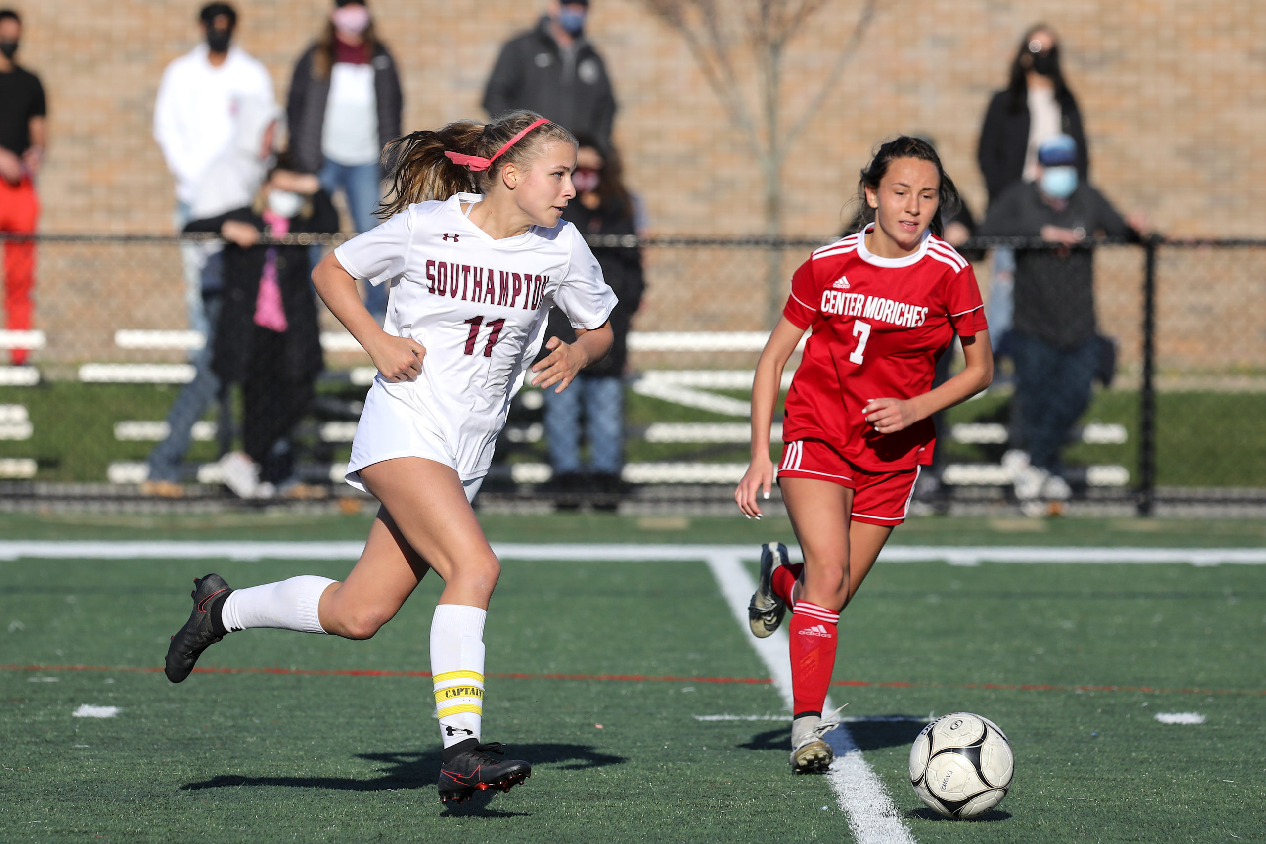 Southampton junior Charlotte Cardel dribbles the ball down the field.