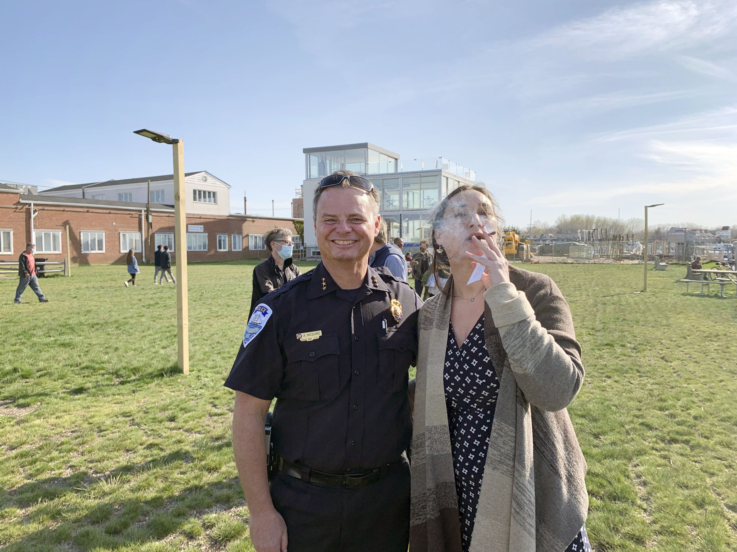 Sag Harbor Police Chief Austin J. McGuire with Nicole Ricci at the 420  Day rally in Steinbeck Park on Tuesday.