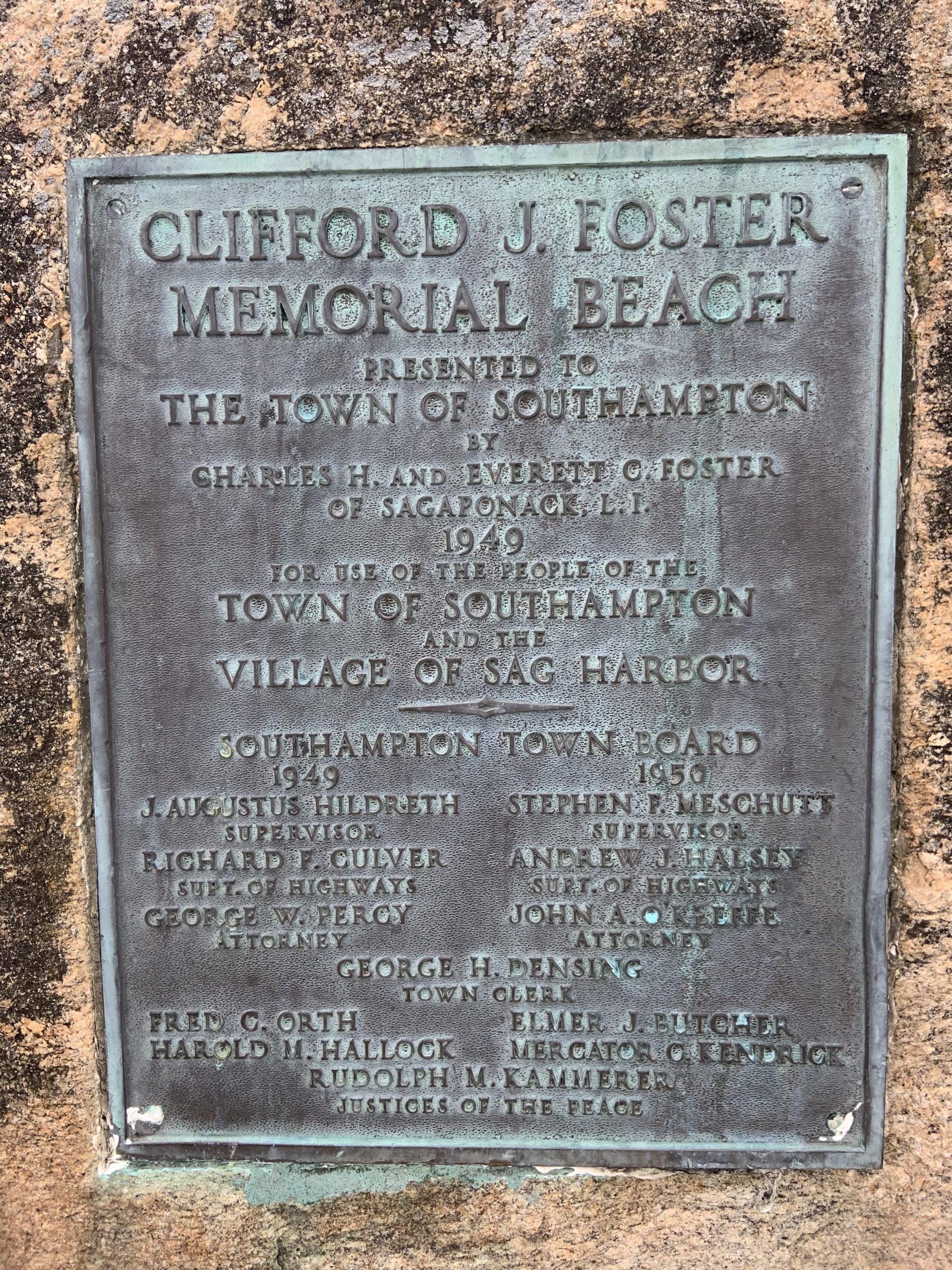 A plaque dedicating Cliford J. Memorial Beach to the residents of both Southampton Town and Sag Harbor Village is placed at what is commonly called Long Beach.