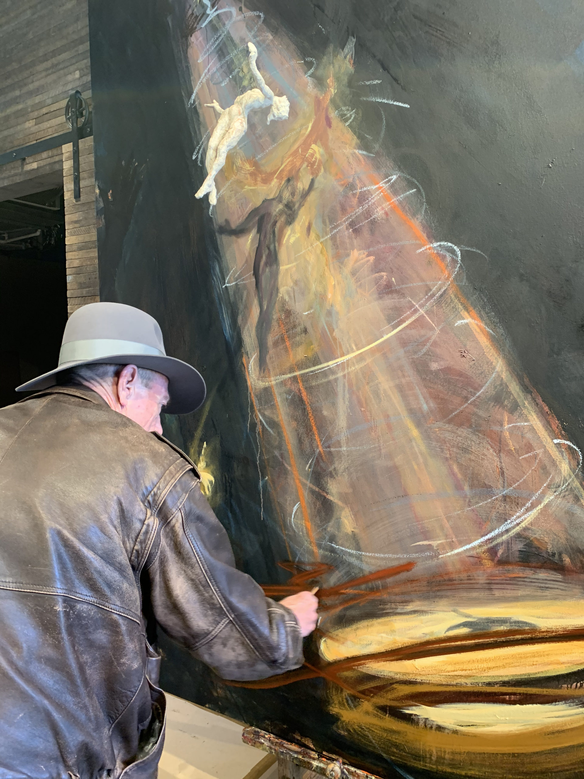 Jim Gingerich at work on a painting in The Church.