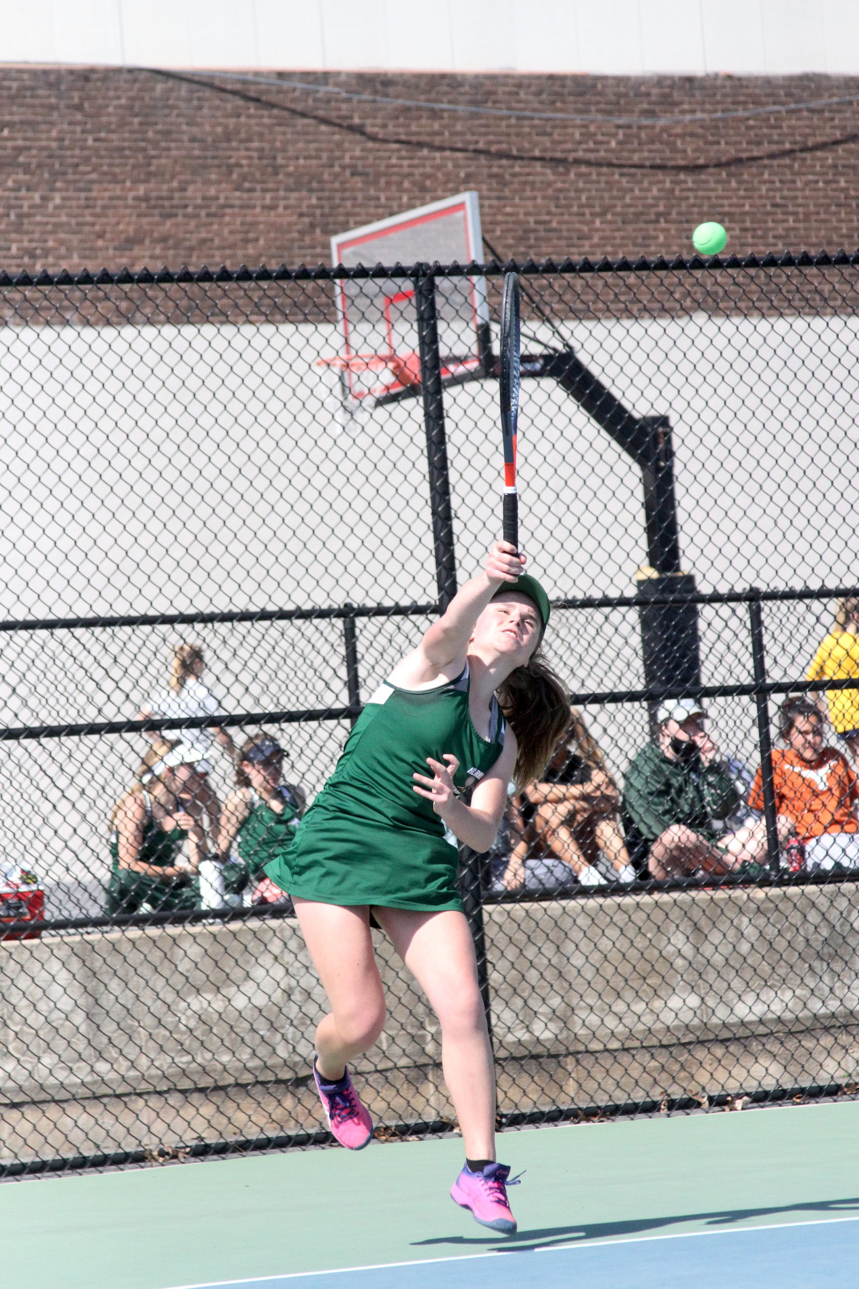 Westhampton Beach freshman Julia Stabile serves the ball in the Division IV doubles finals.